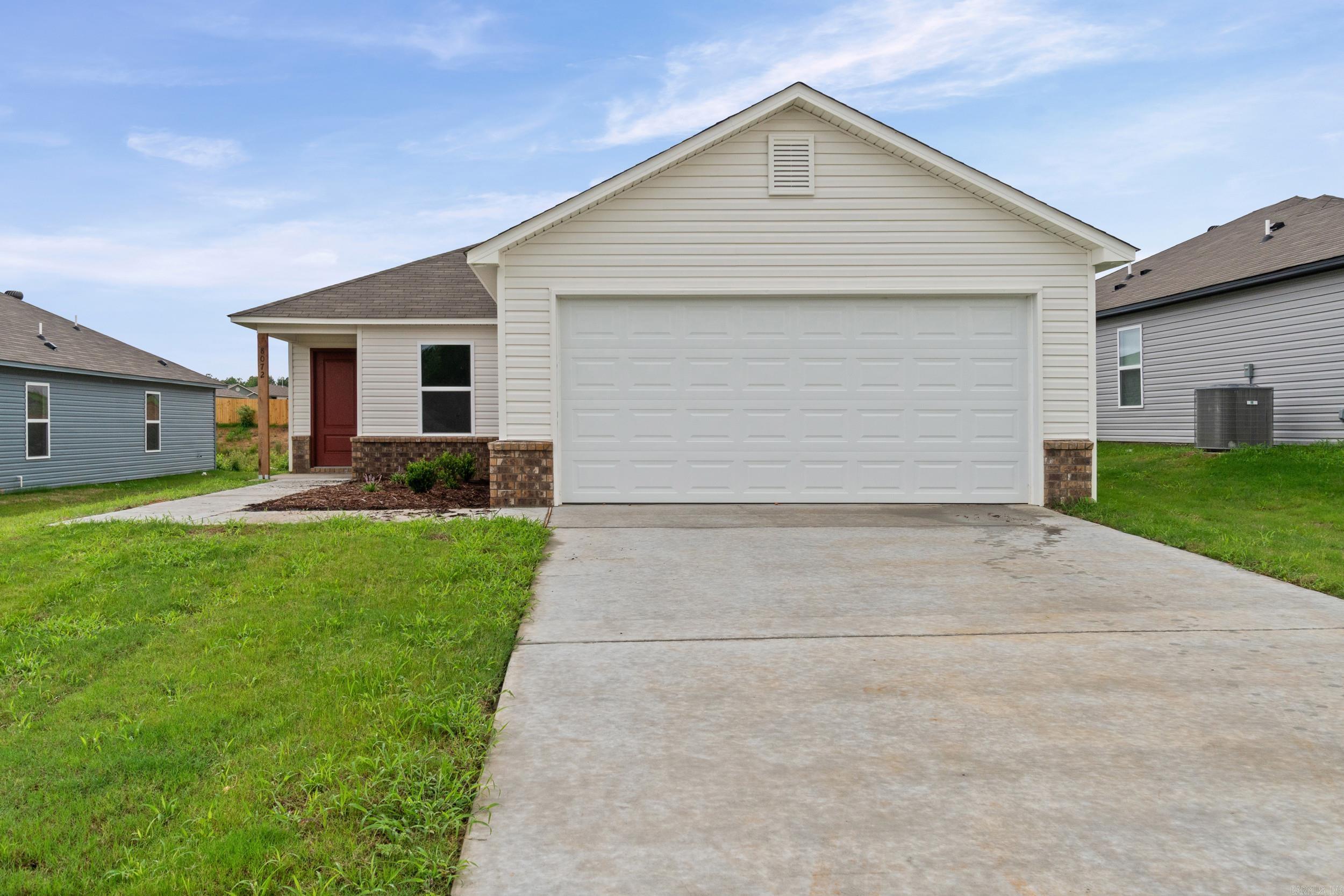 The beautiful Bridgeport plan has a  welcoming covered entryway and front yard landscaping. This one-story home features 4 bedrooms and 2 bathrooms. Enjoy the large open-concept living room, fully equipped kitchen with energy-efficient appliances, ample counterspace, and corner pantry. The laundry room, conveniently located just off the garage, is perfect for any sized family. Learn more about this home today!   **SEE SHOWING REMARKS & AGENT REMARKS FOR IMPORTANT INFORMATION**