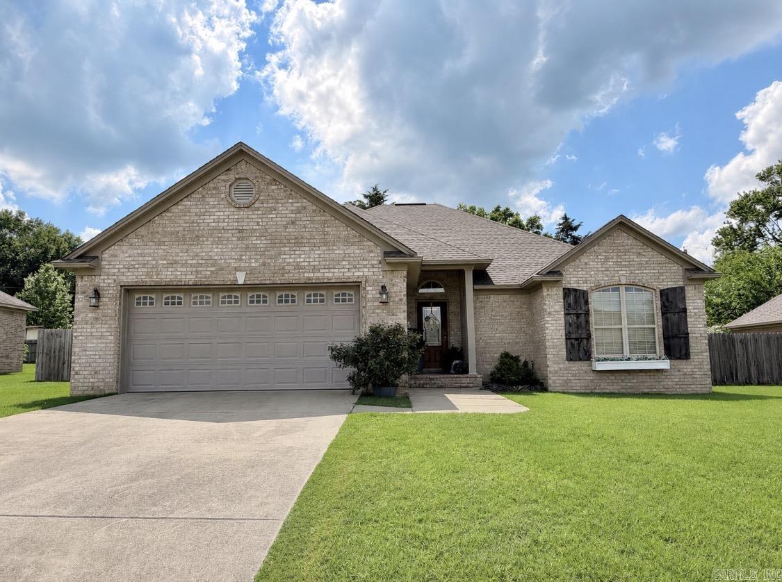 Welcome home to this charming and character-filled residence in the desirable Skyline Meadows subdivision! Perfectly situated in the heart of Searcy, this beautifully maintained 3 bedroom, 2 bath home offers comfort, style, and convenience. Step inside to find gorgeous wood flooring, with custom trim work and built-ins that adds warmth and timeless appeal. The thoughtfully designed floor plan features spacious living areas, a kitchen with a generous amount of storage and counterspace along with a pantry. The large master ensuite is equipped with a walk-in shower and his and her closets. Enjoy a sunroom situated off the living area which leads to a patio overlooking the privacy-fenced backyard perfect for kids to play, pets to run or simply an evening at home.  AGENTS SEE REMARKS!