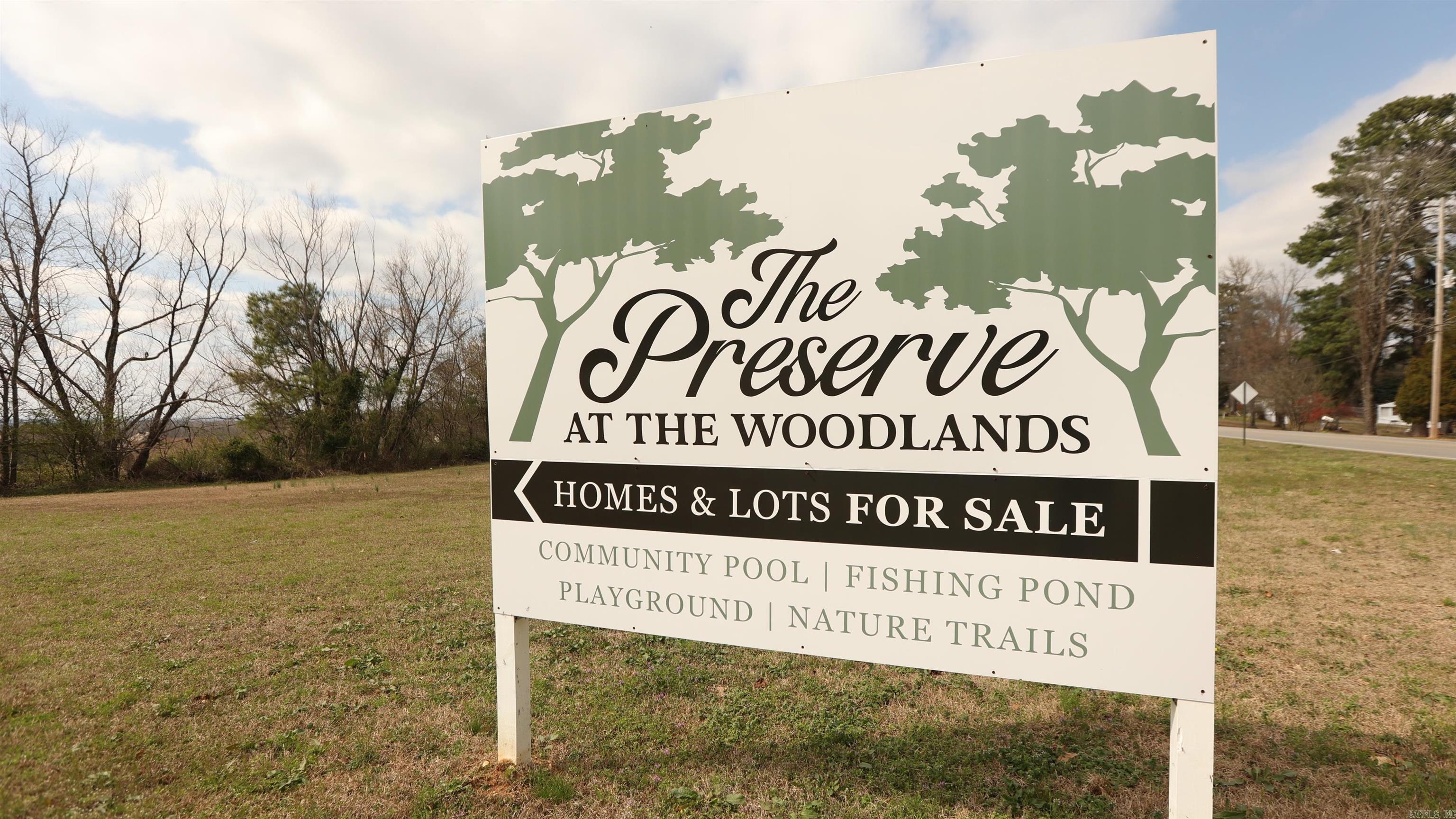 The long awaited Phase 3 of The Preserve at the Woodlands, located in the one of Benton's most desirable subdivisions in Saline County is here! These large lots in the city of Benton (Benton Schools and Howard Perrin Elementary) are here for the taking. These level lots range from just under a half acre up to around one acre in size so there is plenty of room to build your dream home. The Woodlands POA has  amenities galore with a gated pool/ pavilion, new playground for the kiddos, over 3 miles of nature trails, a fishing pond, walking track, and a beautiful creek system so you can really get back to nature. These spacious lots are expected to be ready to build on by summer so do not miss your chance to scoop one up now while they are still available. Realtors see agent remarks!