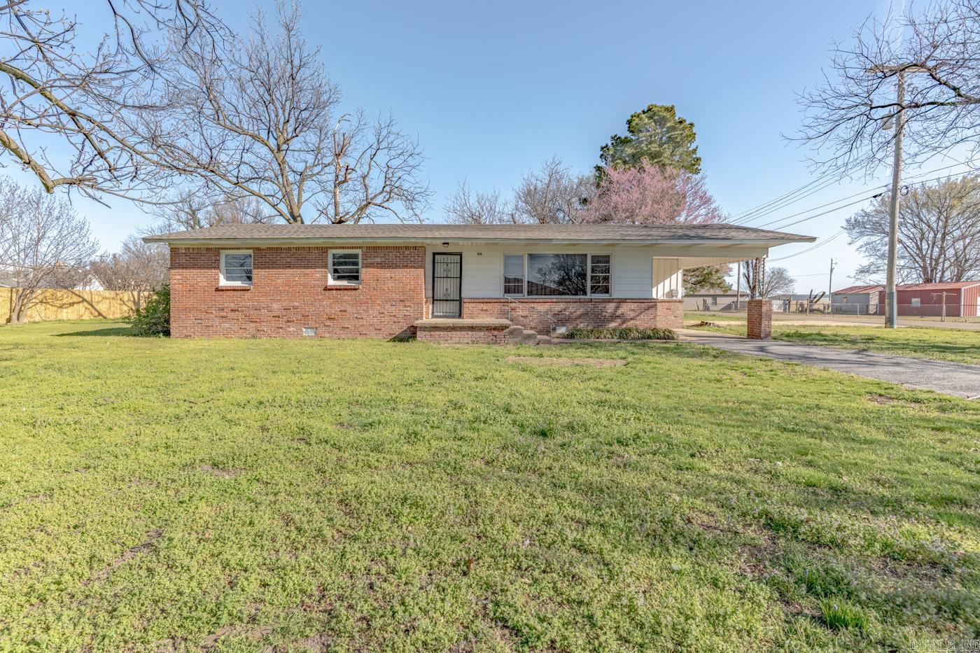 Welcome to the Market 106 E. Texie St. in Monette, Arkansas! This Charming 3-bedroom, 1-bathroom home is situated on a spacious corner lot that measures 0.40+/- acre. This property features original hardwood flooring throughout most of the home, adding warmth and character. The living room showcases beautiful wood interior that create a cozy and inviting atmosphere. Outside, you'll find both a carport and a garage, providing plenty of covered parking and storage space. The property also includes an outdoor storm shelter for added peace of mind. With its classic charm and functional features, this home has great potential and is definitely something special!
