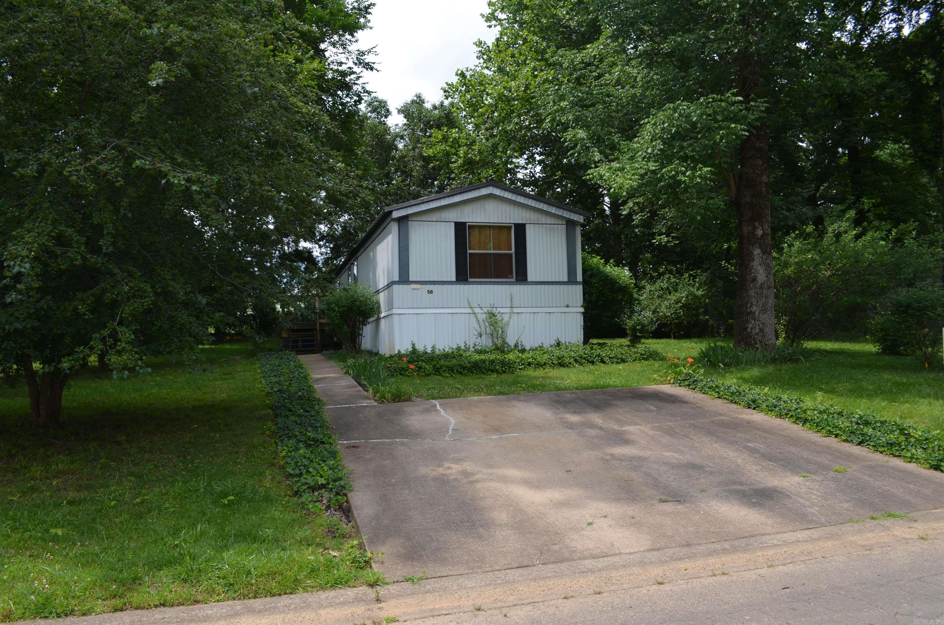 Great first time one owner mobile home or investment property with lot, features three bedroom and two baths. Easy access to I-57 for commute to and from work. Small Storage building. Very well maintained home and yard.  This home is priced to sell would make an excellent choice for rental to increase your investment portfolio value. Metal roof.