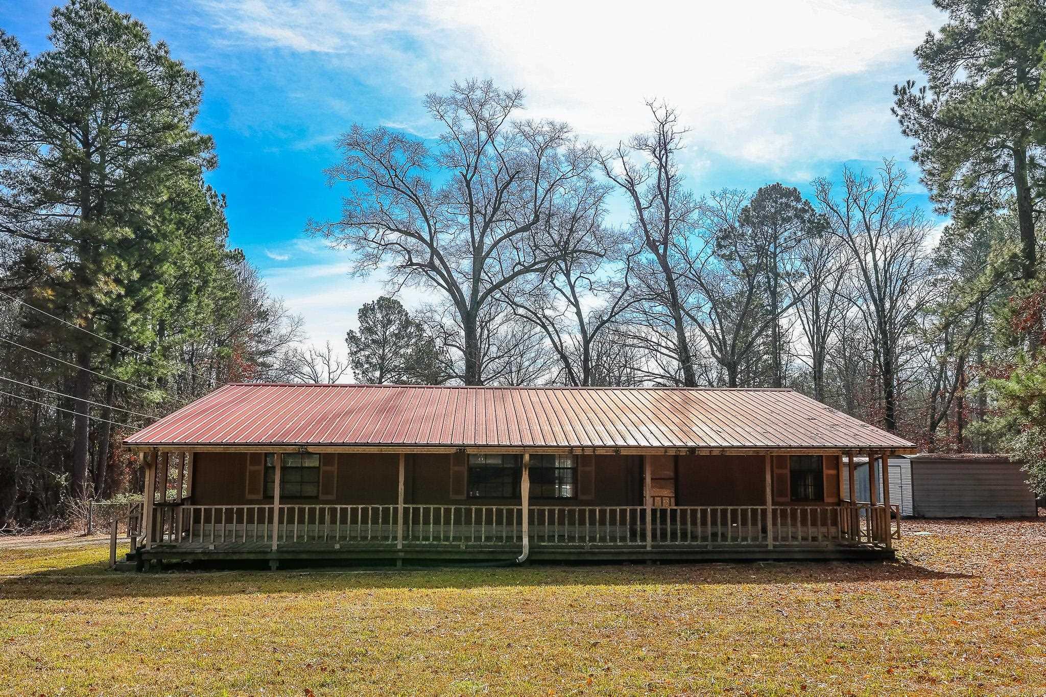 Doublewide on 7 acres more or less. Well maintained mobile home. All new septic system in 2017, New metal roof and master bath remodel in 2016. New vinyl flooring and carpet. Structural Engeneering report in hand for lenders (permenant foundation)