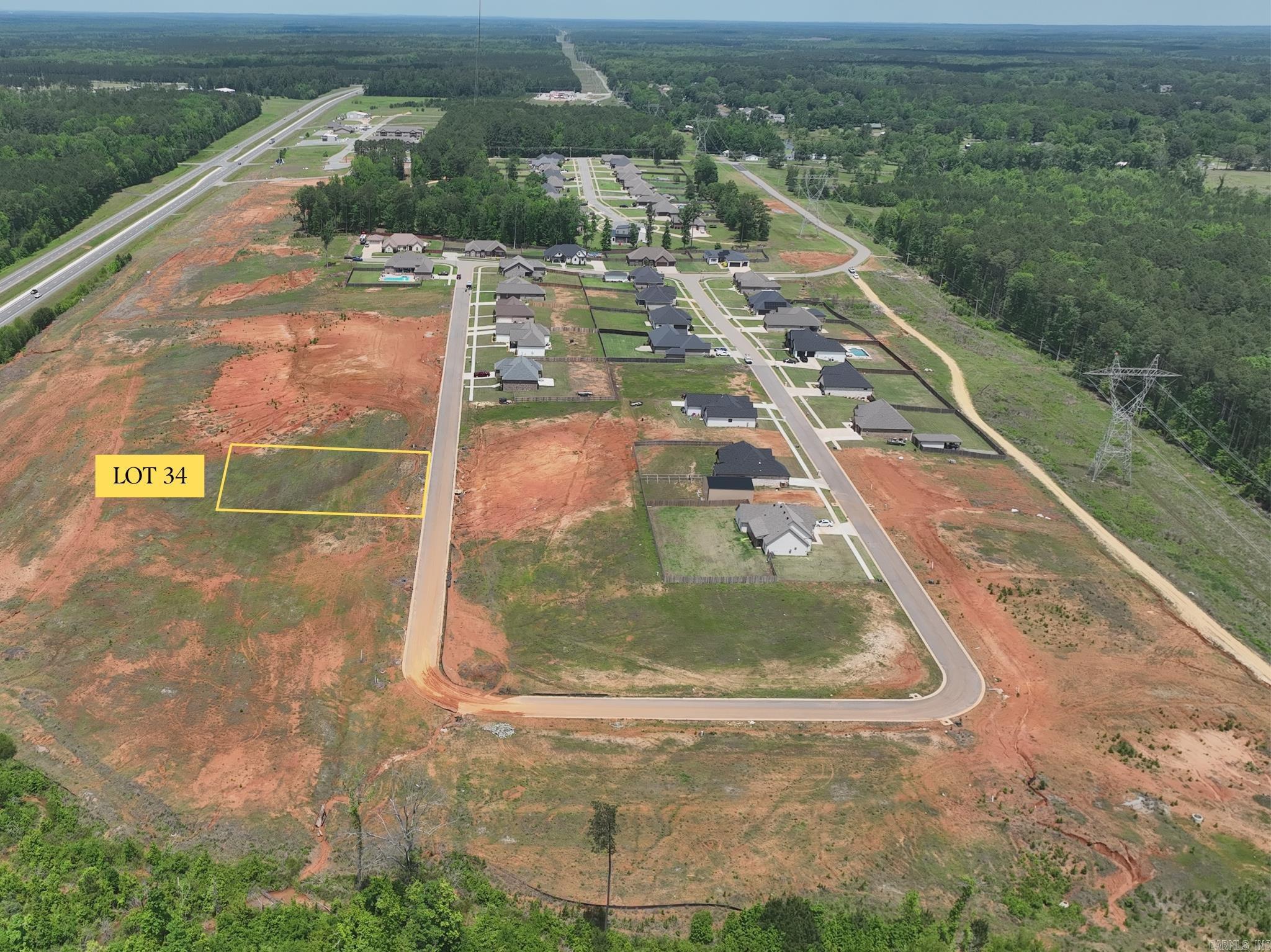 Build your future home in the peaceful Oak Tree South subdivision in Sheridan, Arkansas. Lot 34 offers a convenient location just minutes from Hwy 167, providing quick access to Sheridan, Little Rock, and surrounding areas while still enjoying a quiet residential setting. This homesite combines small-town comfort with easy access to shopping, dining, schools, and everyday amenities. Don’t miss this opportunity to own a residential lot in one of Sheridan’s growing areas.