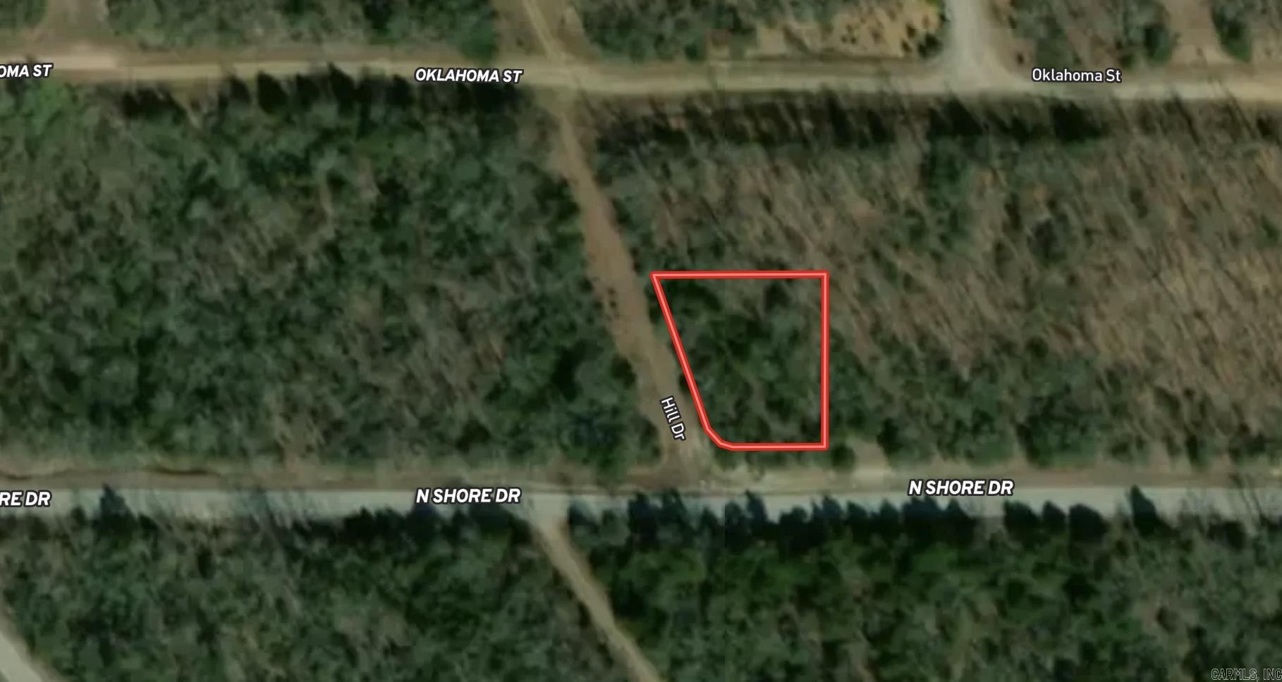 Discover the potential of this beautiful wooded vacant lot located in a quiet area. This property offers a natural setting filled with mature trees, making it an excellent opportunity for those seeking privacy and a peaceful environment.  With no utilities currently on the property, this lot provides a blank canvas for your future plans—whether you're looking to build a custom home, create a private getaway, or invest in land for the future. The restrictions in place help protect the surrounding area and maintain property values, ensuring a well-kept and desirable neighborhood.  Enjoy the beauty of nature while still having the flexibility to develop the land to suit your vision. If you’ve been searching for a wooded parcel with plenty of potential in a protected setting, this property is worth a look!