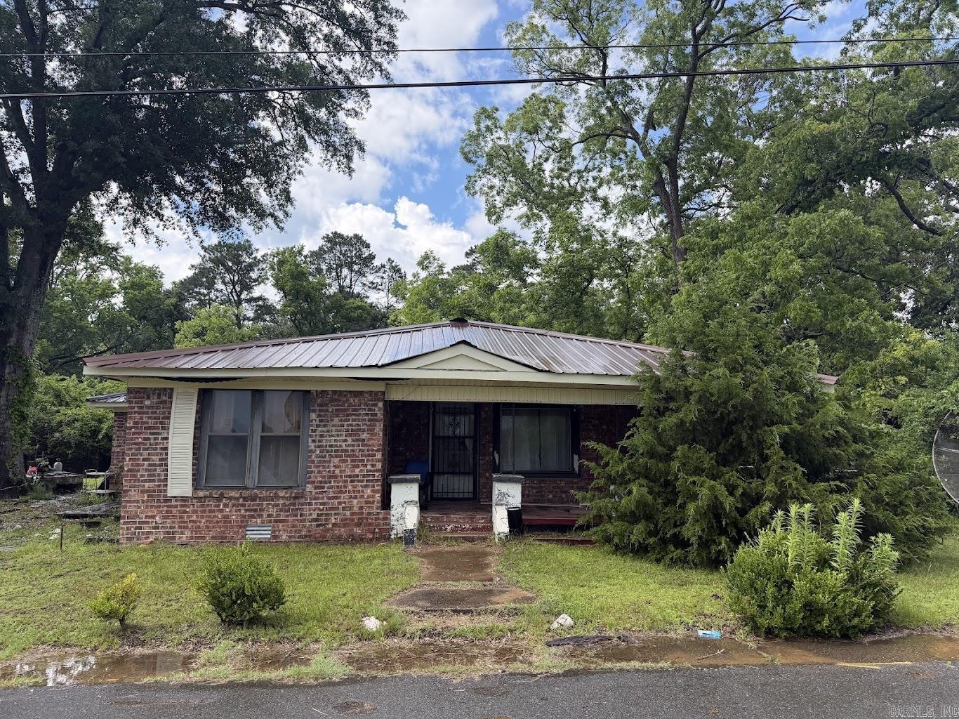 Opportunity awaits with this 3-bedroom, 2-bath property conveniently located in town and close to shopping, dining, schools, and everyday amenities. Offering flexible space with the potential for a 4th bedroom, this home presents endless possibilities for investors, renovators, or buyers ready to make it their own. Whether you're looking for your next fix-and-flip project, long-term rental opportunity, or a property to customize and add value to, this one is worth a look. No seller property disclosure available. Buyers to verify square footage and lot size using their own measurements.