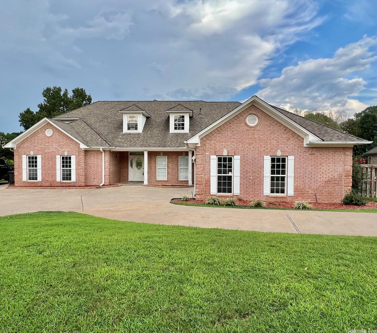You will adore this charming 5 bed 3.5 bath home sitting on approximately 180 feet of lake frontage in the heart of the Northlake subdivision. This property has large fountains and a gazebo just off the back patio with spectacular lake views. This home offers an open kitchen plan and two large family rooms, each equipped with a fireplace, one upstairs one down. Master and two bedrooms on the main level while two bedrooms, game/hobby and 2nd family room upstairs. Make this stunner your forever home today!