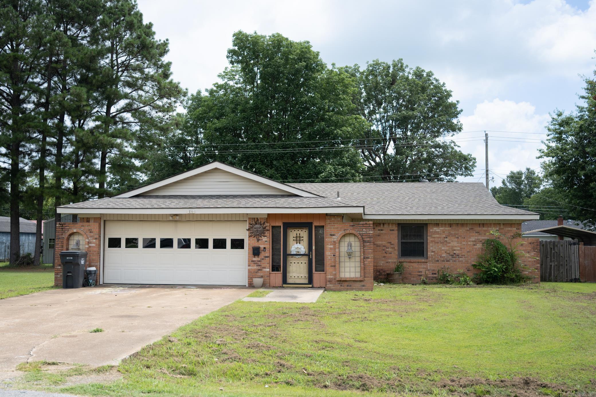 This charming 3-bedroom, 2-bath brick home offers 1,306± square feet of comfortable living space and is ready for a new family to make it their own!  You’ll love the privacy-fenced backyard with a screened-in back porch—the perfect spot to enjoy your morning coffee, relax after a long day, or entertain friends and family. The home also features central heat and air, a 2-car garage, and a beautiful foyer!   You’ll also have peace of mind knowing several major updates have already been completed: New roof (late 2023) HVAC replaced (2018) New insulation (2018) New windows (2018)