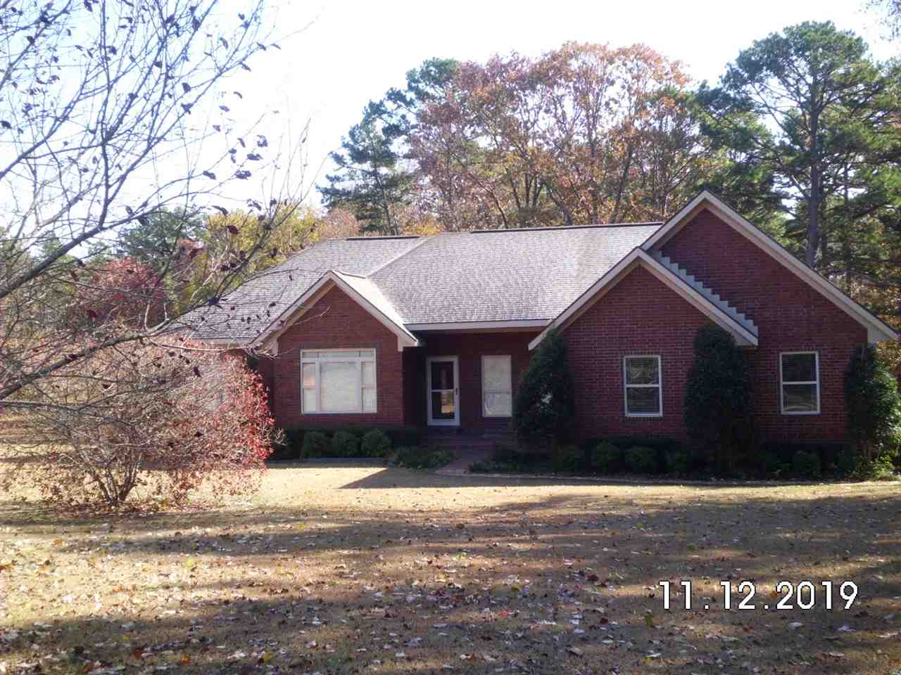 Beautiful brick home nestled on a large lot not far from the lake. Home features wood vaulted ceilings, wood floors, tile floors in kitchen & baths, over sized garage, awesome screened in porch, wonderful rock fireplace and office space with lots of built ins. There is a Jack & Jill bathroom in between 2 guest rooms. This property sits on 2.67 acres, is just up the road from Greers Ferry Lake, and gives you all the privacy you might want. You must come see this one!!!