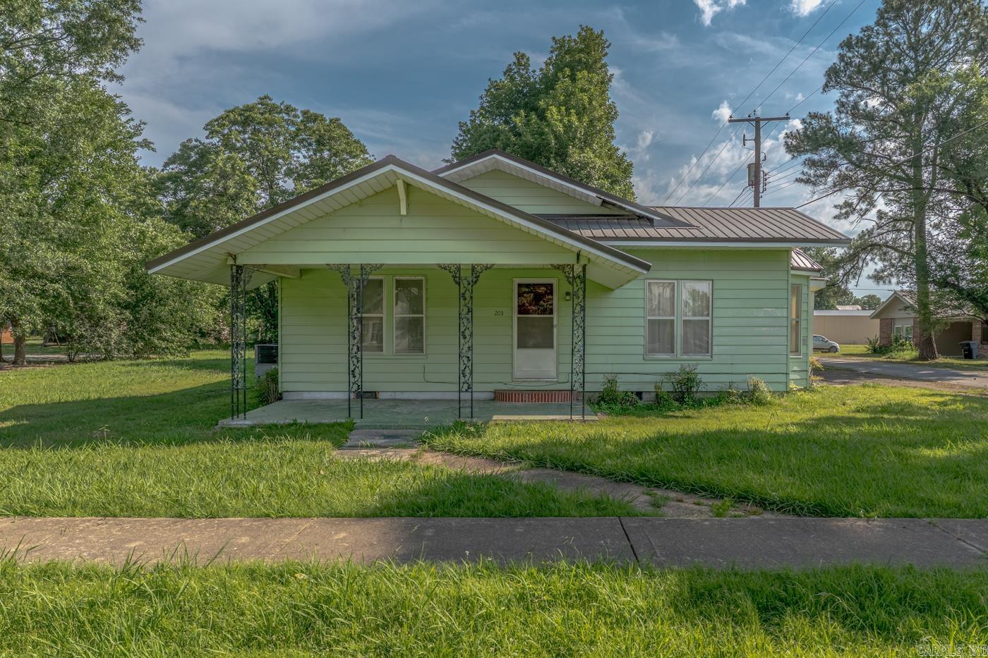 Welcome to 203 W Third Street in Weiner, Arkansas—a charming property offering small-town living with plenty of potential. Situated on a spacious lot in an established neighborhood, this home combines character, comfort, and affordability.  Inside, you'll find generous living space with room to customize and make your own. The home's traditional layout provides flexibility for everyday living, while large windows bring in natural light throughout. Whether you're a first-time homebuyer, investor, or someone looking to enjoy the peaceful pace of rural Arkansas, this property presents an excellent opportunity.  Conveniently located near local schools, parks, and community amenities, 203 W Third Street offers the warmth of a close-knit community while remaining within easy driving distance of larger surrounding cities. This home is With its classic appeal and potential for updates or personalization, this home is ready for its next chapter.  Don't miss your chance to own a piece of Weiner's hometown charm—schedule your showing today!