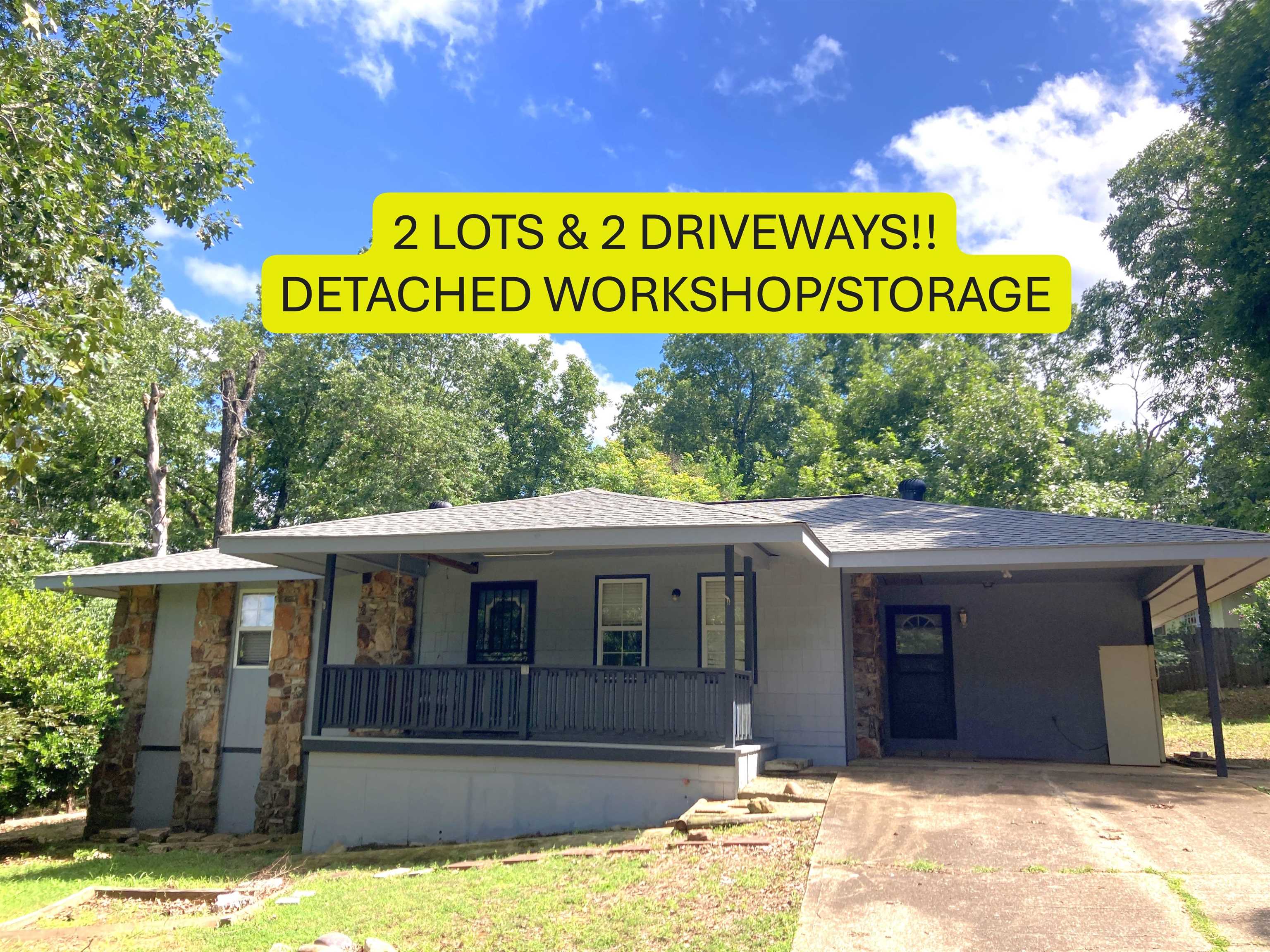 PRICED REDUCED!  MOTIVATED SELLER! HOME on 2 LOTS w/approx 18'x24' detached WORKSHOP/STORAGE and 2nd driveway! 2 Bedroom, 1.5 Bath home. This home has a big open floor plan with vaulted ceilings, new ceiling fan w/lights & native stone fireplace with gas hookup. Large Mudroom off the carport is perfect for extra space for a freezer and shelves for a pantry. Newer countertops and Gas Cookstove freshen up the kitchen. Nice large, tiled shower with seat in the hall bathroom and 2 good size bedrooms. All of the windows have been replaced with vinyl double pain windows. New 200-amp breaker box was installed 2 years ago to bring the electrical in the house up to today's needs. Approx 17'x8' Covered front porch and big back deck (approx. 15'3"x12'3") for family BBQs. The deck even has a propane hookup for your gas grill or you could use it for your patio heater! The second lot has had an additional driveway that goes to the side street for easy access to the detached shop/storage building and to better access the main road. Listing #2426.Measurements from ArCo Data
