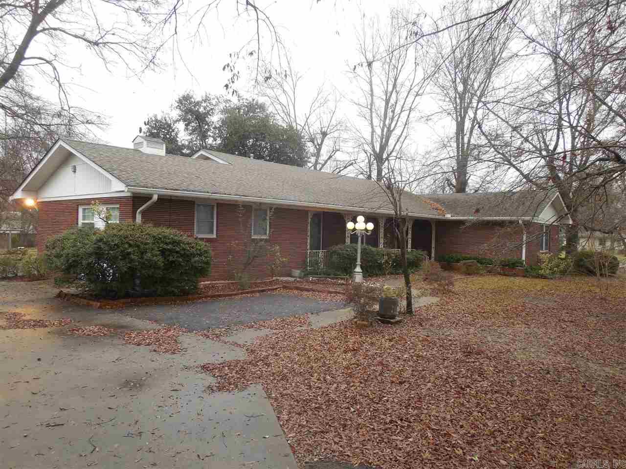 A most awsome home.Full of Southeren charm.A sun room to enjoy.And a lg 30 by 50 shop.detached garage with screen in porch.Beautiful landscaping.