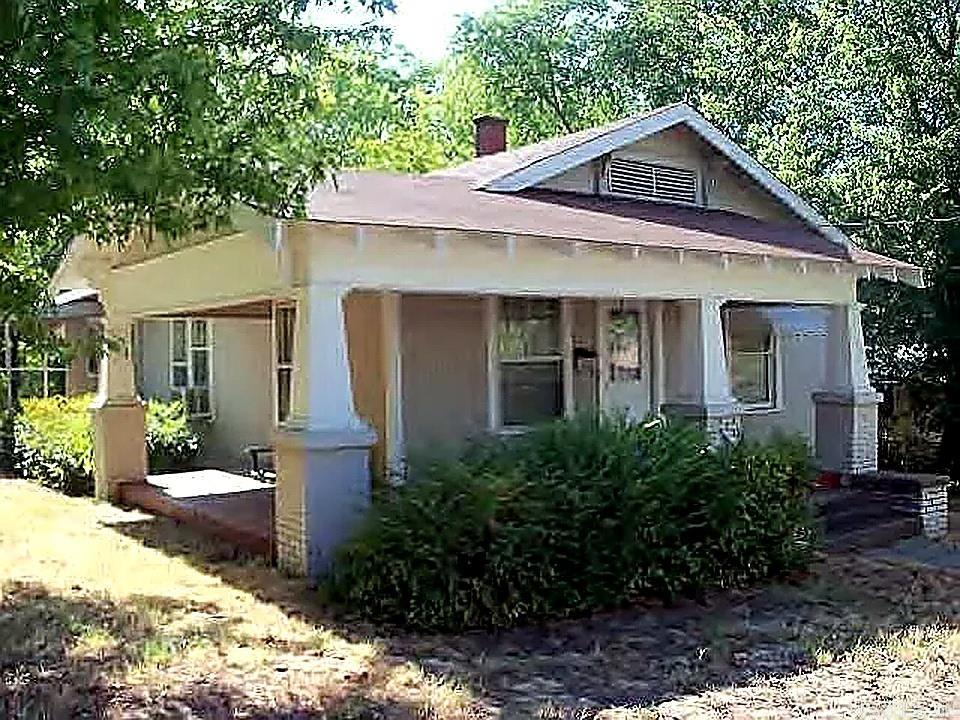 Opportunity awaits in the heart of Clarksville! This 2-bedroom, 1-bath home offering approximately 1,139 square feet is full of potential and ready for its next chapter. With charming curb appeal, a spacious covered front porch, and a solid structure, this property provides a great foundation for the right buyer with vision.  The home is currently livable but will require a significant clean-out and cosmetic improvements.