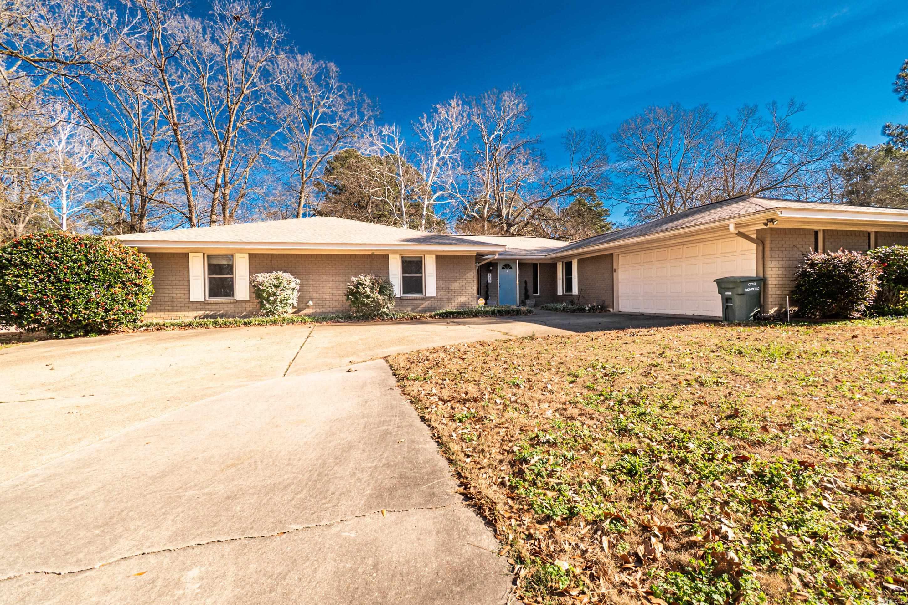 A spacious 4-bedroom, 3-bath home offering approximately 2,620 sq ft of living space on a 0.31-acre lot. Built in 1974, it features an open living area with an electric fireplace, a large kitchen with island seating, and a private primary suite with a jetted tub and separate shower. Outside you’ll find a fenced backyard, covered patio, storage building, and a two-car garage — all in a convenient Monticello location close to schools and amenities.