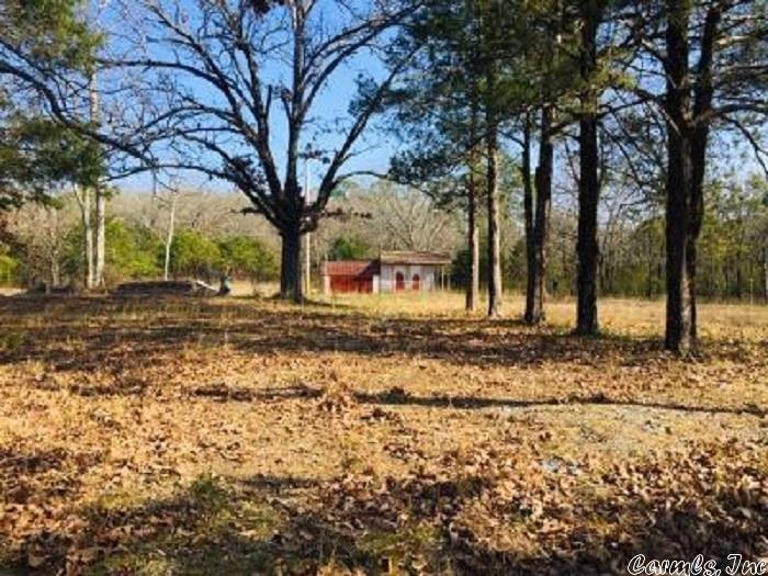 Approximately 1.83 acres more or less joining National Forest with Mountain views! Wonderful business potential. Was an old RV campground and has concrete shower house and storm shelter. All this close to the recreational areas and 1 1/2 mile from the Ouachita River.Buyers will need to get survey to know the exact acreage and boundaries.