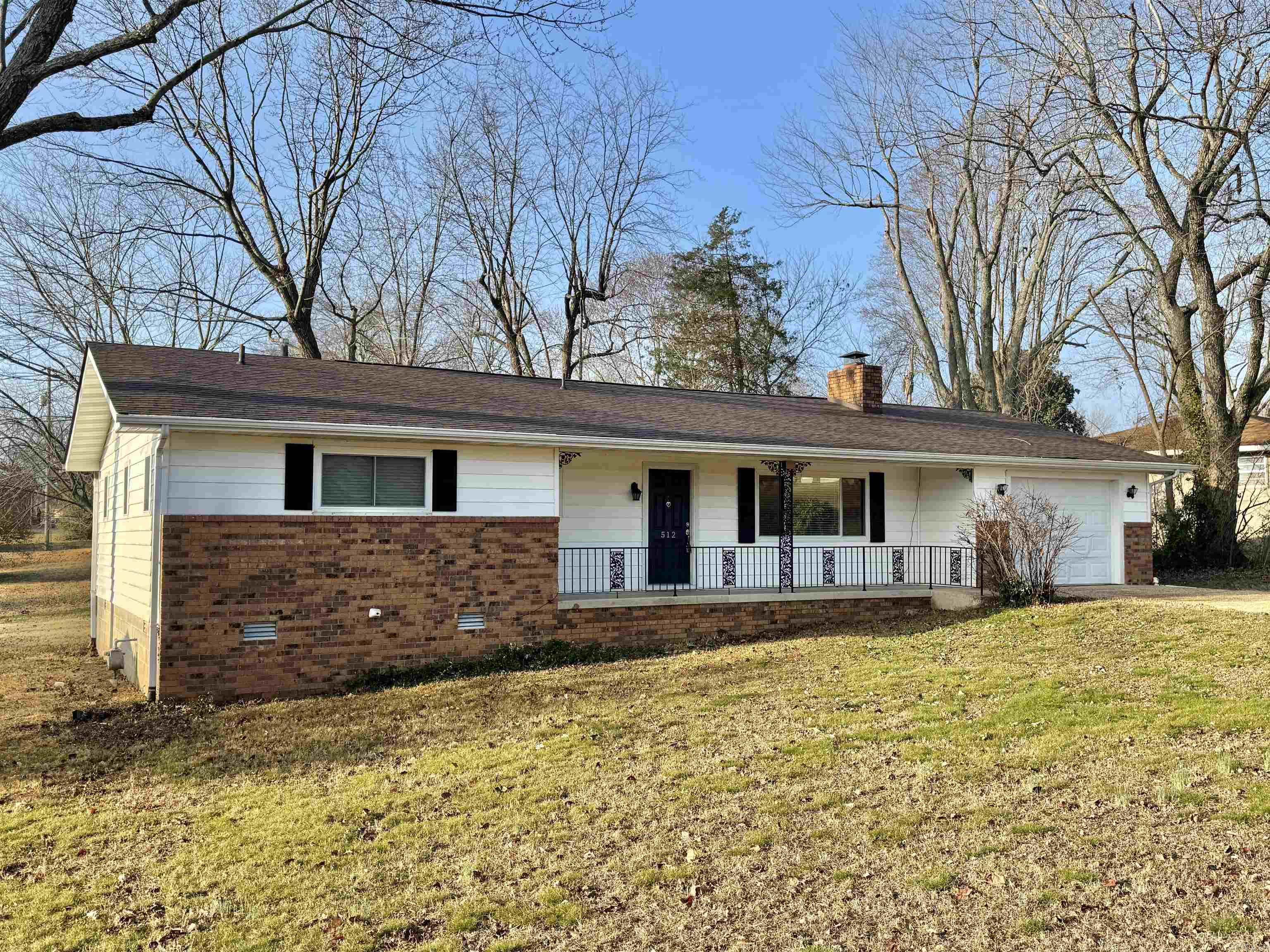 3 bedroom, 2 bath home conveniently located in town and just blocks from the hospital. New shingles in 2025.The home offers central heat and air, natural gas heat and hot water, and a cozy wood-burning fireplace for added comfort. Enjoy outdoor living on the large back deck, perfect for relaxing or entertaining, and the convenience of a one-car garage. Situated in a nice, established neighborhood close to shopping, dining, and everyday amenities—this home offers comfort, efficiency, and a great in-town location.