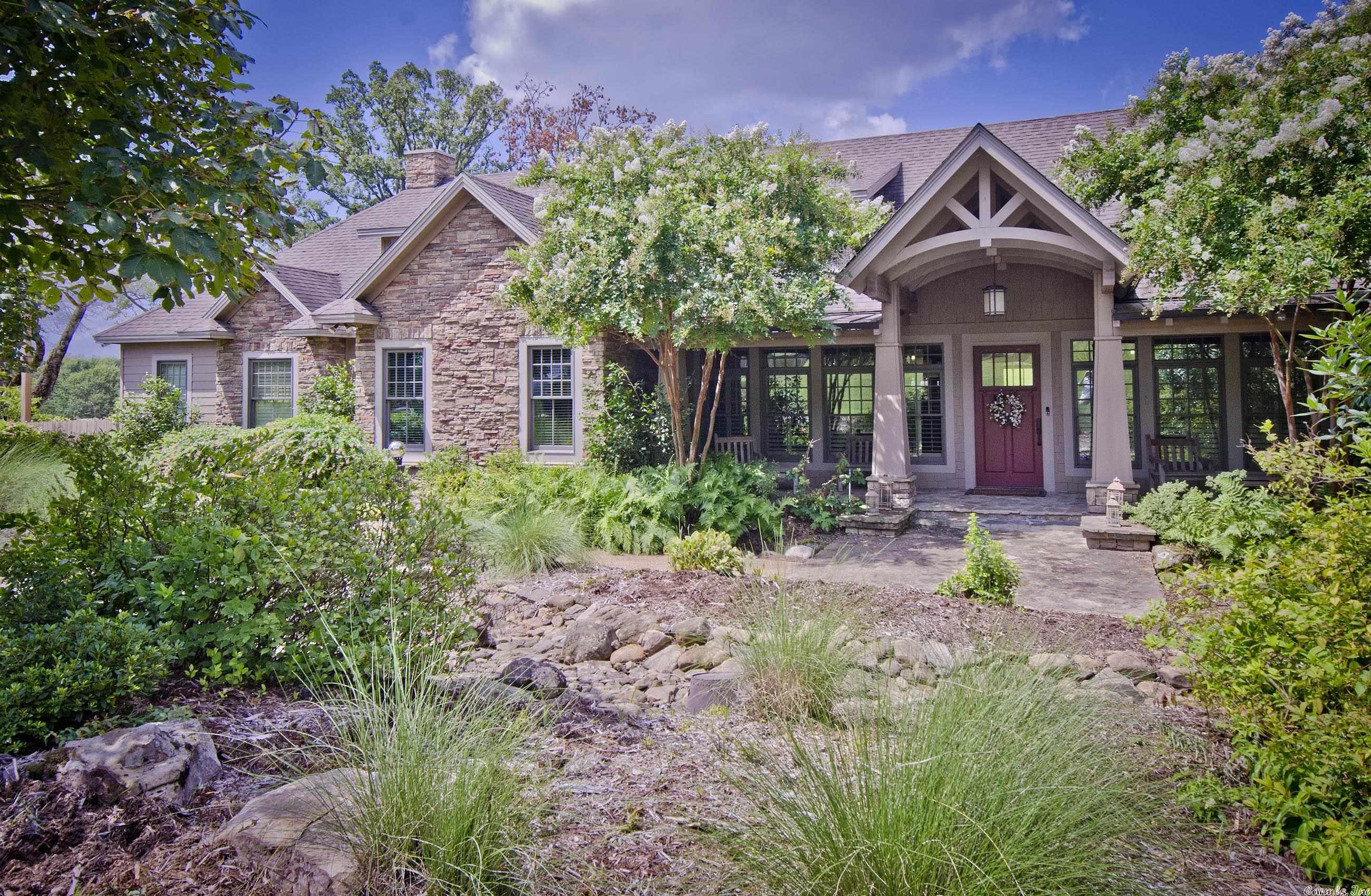 Stunning custom built home with no expense spared! Located on over 6 acres. One main level and an additional exercise/saferoom below. Beautiful quarter sawn oak flooring.4 Bedrooms, 4 Bathrooms & 1/2 bath. Current home office could be used as a 5th bedroom. Chef's kitchen featuring two large islands, granite countertops & subzero fridge/freezer. Enjoy the evenings in the screened porch or morning in the sunroom. Two car garage & outdoor kitchen. Make appointment today!