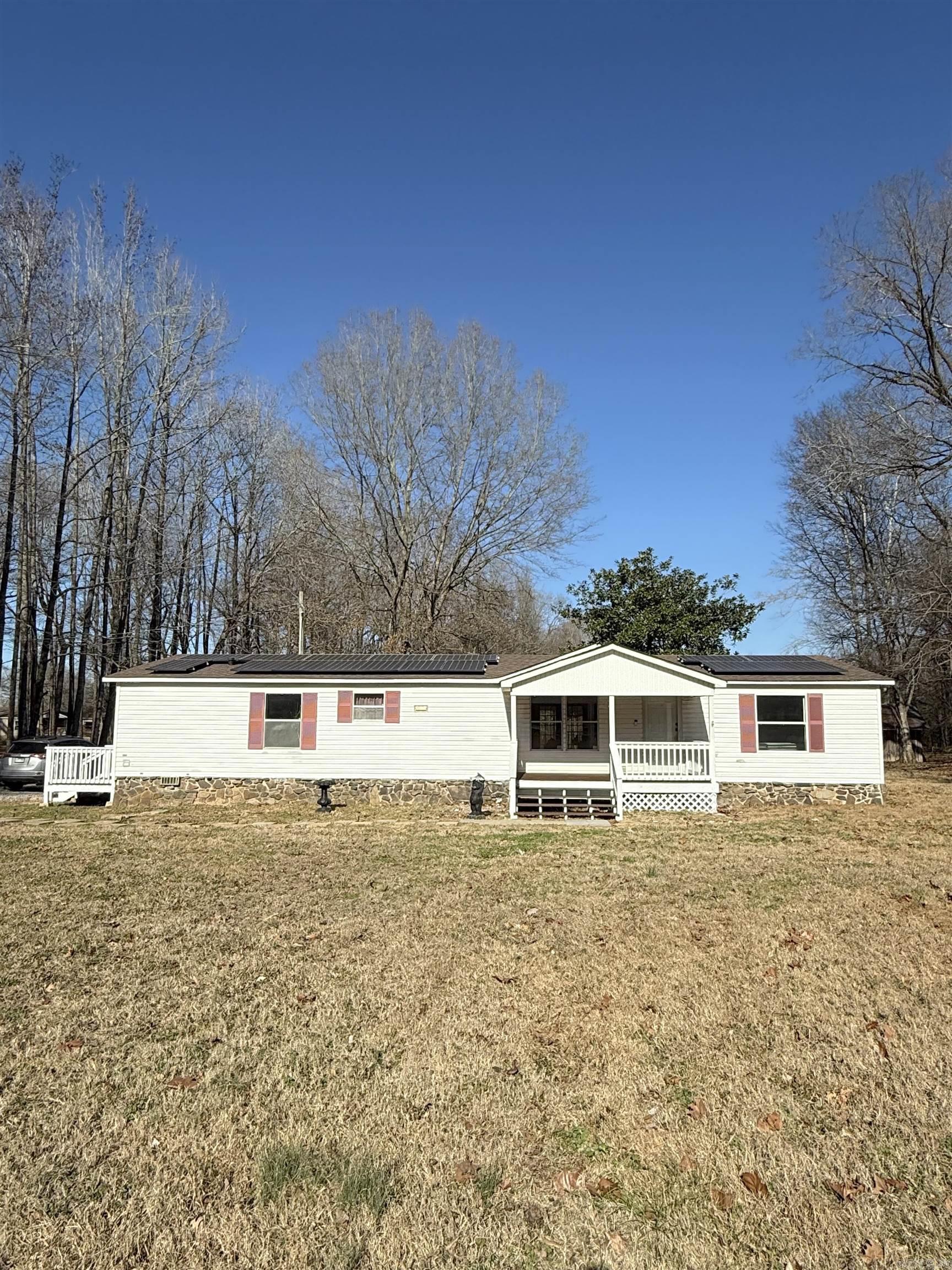 **SOLAR WILL BE PAID OFF AT CLOSING** Looking for a great family home in the country but still close to town? Come check out this 3-bed, 2-bath updated split floor plan home with over 1600 sqft. The home sits on over 3 beautiful acres, with most of it cleared. There is an additonal storage building with electricity that can be used for hobbies. Call today to set up your private showing. Home is on a permanent foundation and does qualify for financing.