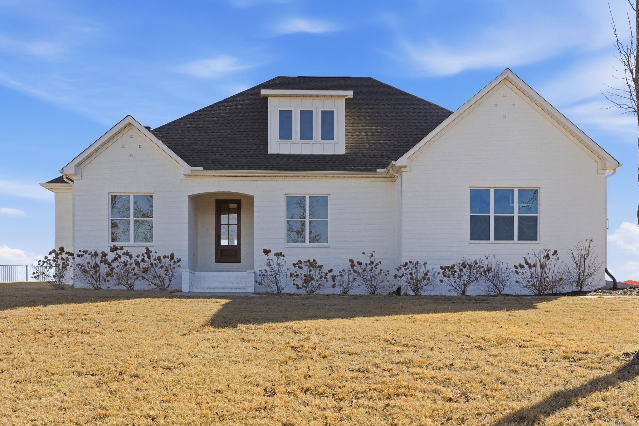 Open Concept floor plan with incredible views of Lake Maumelle, Pinnacle Mountain and the foothills of the Ouachita National Forest on 1.2 acre lot in gated subdivision. 4 bed 3 bath with room to add an ensuite bathroom and expand the upstairs significantly if desired. Ample storage space - custom finishes on the interior.