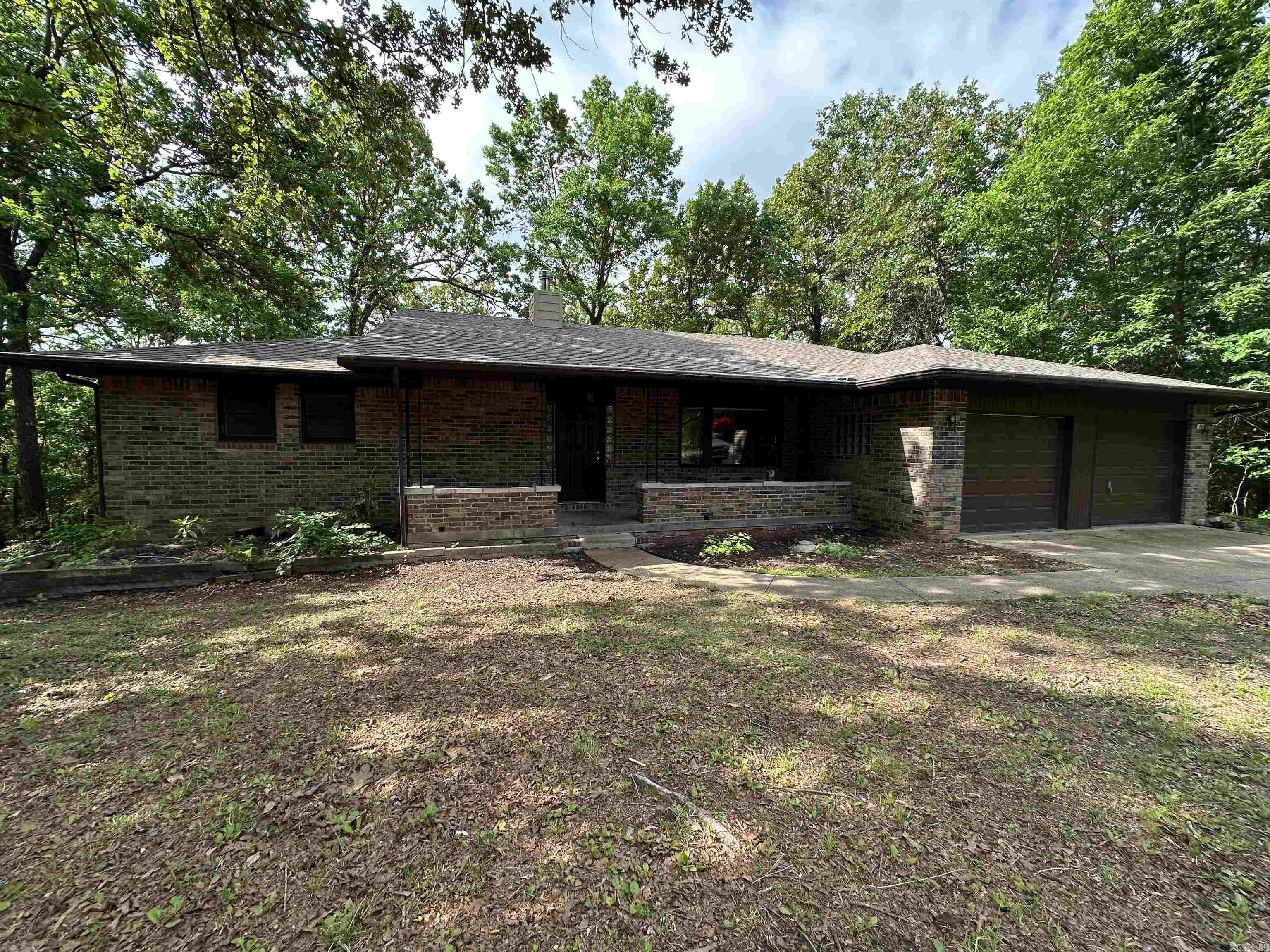 Discover the perfect blend of comfort and natural beauty at 76 Bayview Drive. This inviting 3BR/2BA home offers 1,541 sq ft of well-designed living space, highlighted by warm interiors and plenty of natural light. Located just moments from Norfork Lake, it’s ideal for boating, fishing, and outdoor adventure. Enjoy peaceful mornings on the porch, a spacious yard for gardening or play, and the quiet charm of Mountain Home living.