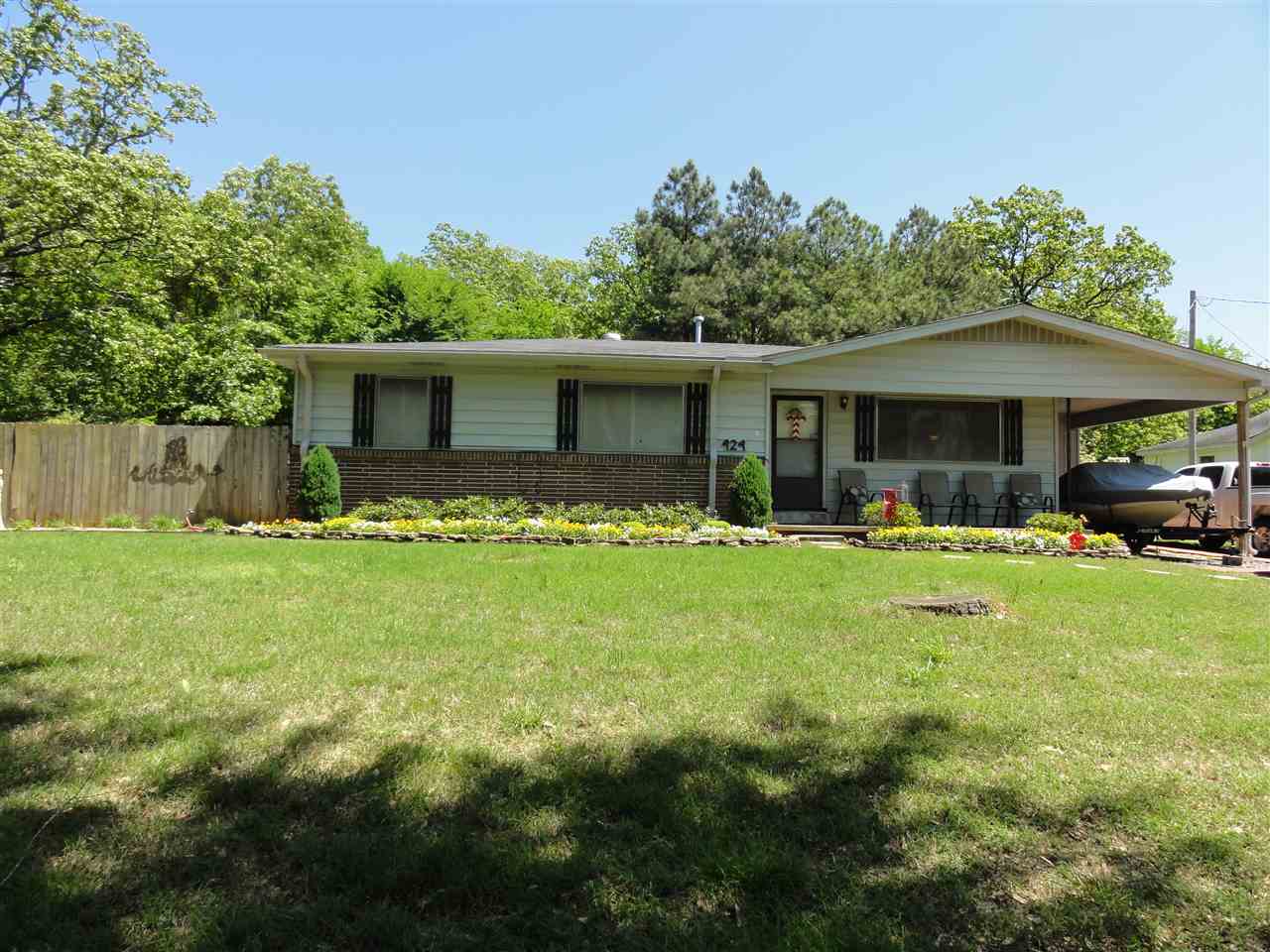 Cutes home ever!!!  Perfect first time buyer home.  Tons of updates. Stainless appliances with gas stove.  Open floor plan.  Refinished hardwood floors throughout the main living areas. Tile in Kitchen and bath.  Sprinkler system in front yard with extra landscaping.  Granite vanity in bath with new tub/shower.  Above ground pool & new pump surrounded by privacy fence.  HVAC appx 2-3 yrs old.  Roof 7-8 yrs old. Huge laundry.  All of this on a 1/2 acre lot.  Sq Ft is approx measuring is encouraged.
