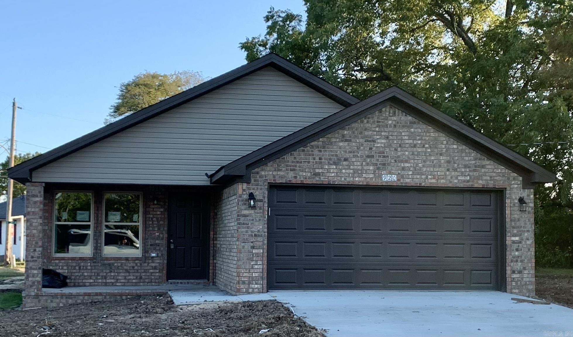 BRAND NEW ALL BRICK WELL BUILT OPEN FLOOR PLAN HOME WITH GRANITE COUNTERTOPS, STAINLESS APPLIANCES, PANTRY, WIDE HALLWAY, LAUNDRY ROOM WITH CABINETRY, MASTER SUITE WITH WALK-IN CLOSET, MASTER BATH AND HALL BATH BOTH HAVE GRANITE COUNTERTOPS, LVP FLOORS THROUGHOUT, CUSTOM CROWN & TRIM IN MAIN AREAS, SMOKE DETECTORS, 2 CAR GARAGE AND A CUTE FRONT PORCH! A MUST SEE!Photo of model home.