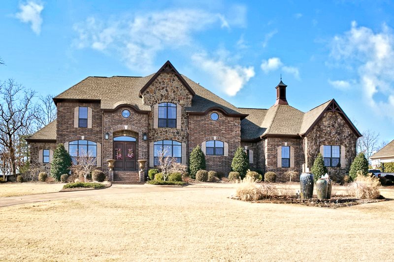 Breathtaking home the minute you walk in!  Numerous living spaces with each a touch of style and warm comfort!  Open, free flowing and perfect view of pool and landscaping--right on golf course!  Double staircase, wine room, private office, media room, game room and more. Master bedroom down and kid's rooms plus game room and media room upstairs. Have to see to appreciate quality! Pool with waterfall and pool house for storage. Extensive landscaping features.  Safe room. For comps, see agent notes.