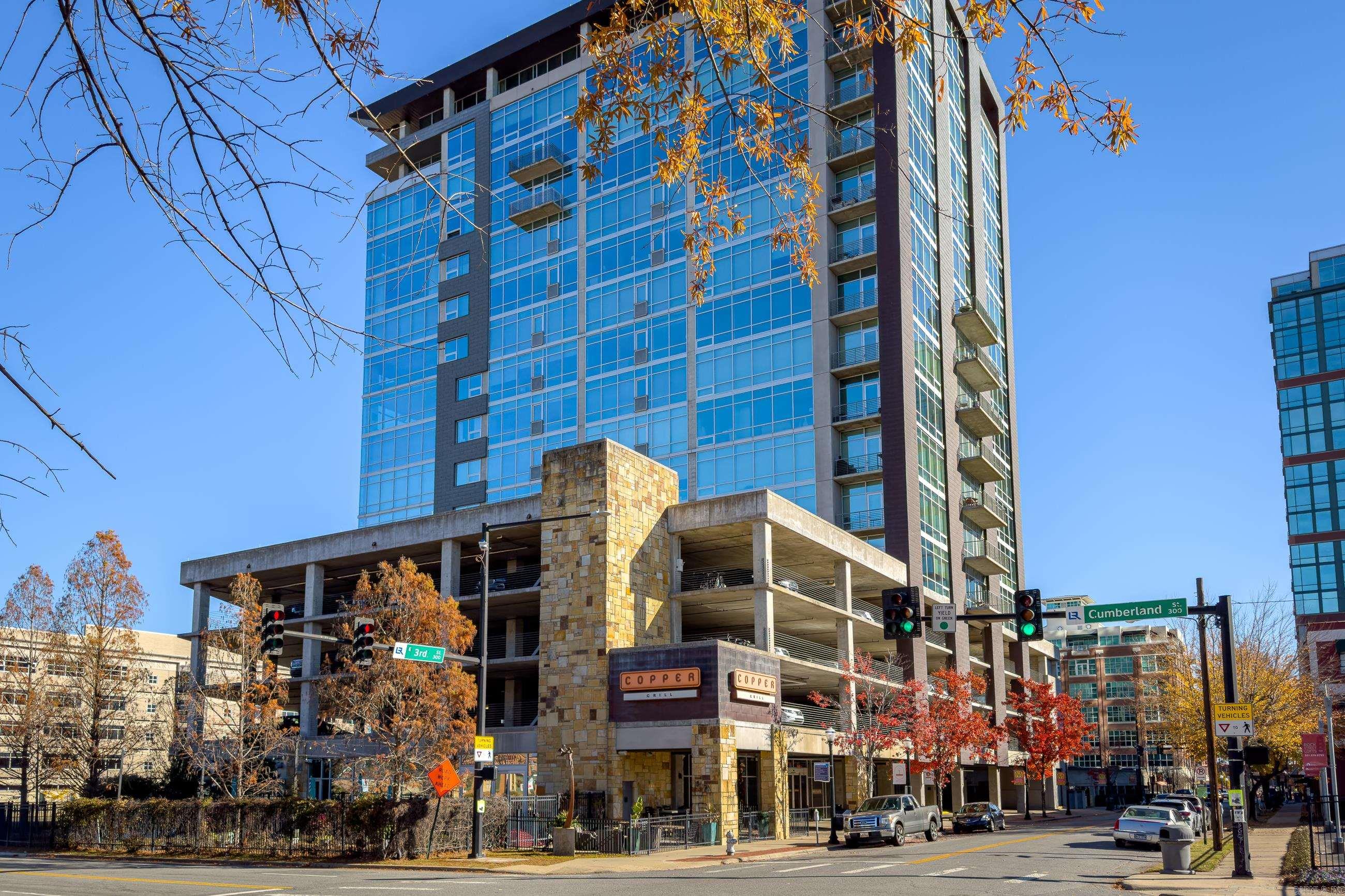 Stunning downtown penthouse with wrap around balcony overlooking the Arkansas River. This 3 bedroom, 3 bath condo has beautiful finishes in every corner including Marquise marble tile flooring throughout, gorgeous custom light fixtures, two fireplaces, solid white oak built ins and floor to ceiling windows in every room capturing beautiful river and skyline views. Open floor concept including living room, custom kitchen w/ Brazilian granite countertops, cabinet front stainless appliances including double ovens and warming drawer, island with seating and walk in pantry. Separate formal dining room. Primary suite with double marble vanities, custom tile walk in shower and soaker tub. Large walk in closet with built in shelves, drawers and dressers. Two guest bedrooms, two guest baths with marble vanities. Laundry room. Two new HVAC systems and new hot water heater. Condo also features a Creston home automation system. Residents enjoy condo amenities including two secured parking spaces, indoor and outside storage space, swimming pool, fitness center, dog area, gated parking and concierge services.  This incredible residence offers elegance, craftsmanship and convenience.