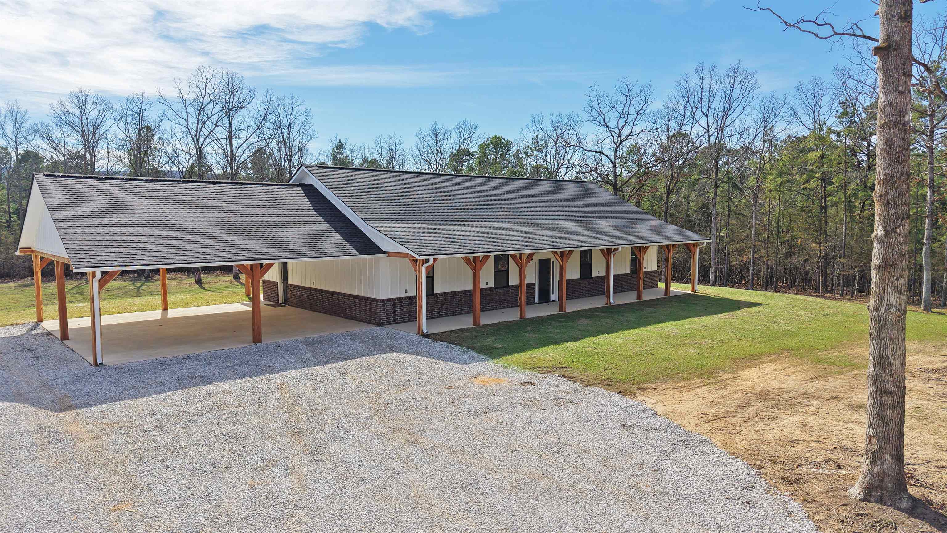 This brand new 2026 custom-built home sits on 5.14 scenic acres in the secluded Chinquapin Ridge Estates Subdivision near the beautiful White River. Featuring 1,920 sq ft of open-concept living space, city water and septic this 3-bedroom, 2-bathroom home is brilliantly designed for comfort and quality. This home offers solid craftsmanship and attention to detail—from custom cabinetry, new appliances, a large center kitchen island with breakfast bar and a spacious walk-in pantry. The primary suite features an elegant ensuite bathroom with his-and-hers vanities and a walk-in closet. Energy-efficient windows, central heat and air, and backup gas heat ensure year-round comfort and convenience. Enjoy outdoor living at its finest with front and back porches, accented by 8x8 cedar beams, and a large two-car carport. Residents of this subdivision enjoy direct White River access with a private boat ramp just ½ mile away—a rare and desirable amenity for fishing, boating, and weekend relaxation. This property delivers the best of the Arkansas country lifestyle, listed for only $375,000. Pictures don’t do it justice—come see this exceptional home for yourself!