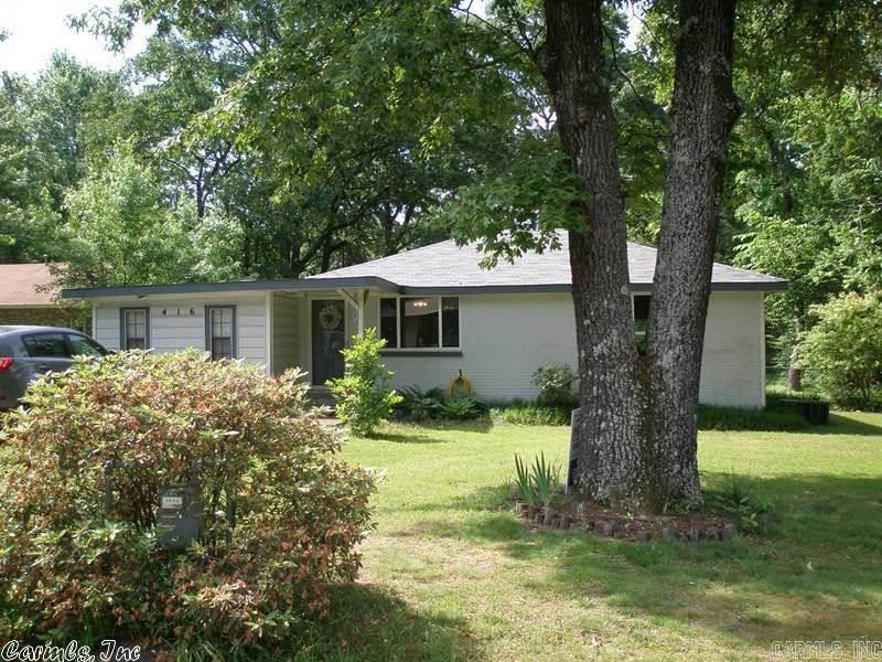Beautiful 1/2 acre plus, level lot fully fenced with storage shed and inclosed workshop new 2012. Hardwood and ceramic tile flooring, separate dining, den, laundry. Kitchen updated 2010, new roof 2014, new windows 2013, new HVAC 2009, bath remodeled 2009, new deck 2008, wood burning stove, ceiling fans, loaded with updates and priced to sell!