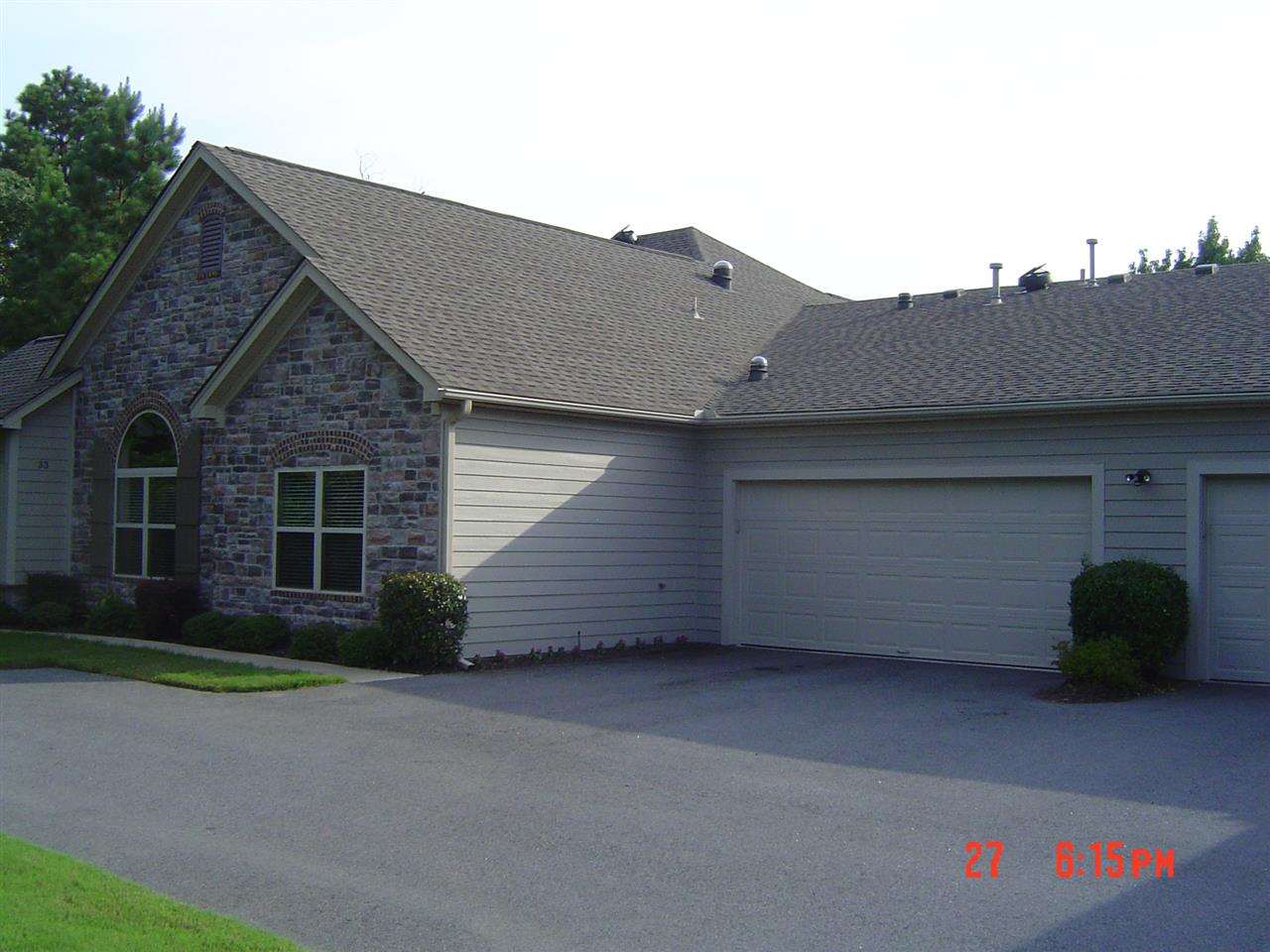 Custom built one level townhome.  Most customized & most private home in community.  Wood floors, granite, top of line appliances, multiple solar tubes, very private patio, custom tile work, extra large laundry.  Next to permanent green space on two sides.  Total custom closet in master.  See showing instructions and Agent Remarks.
