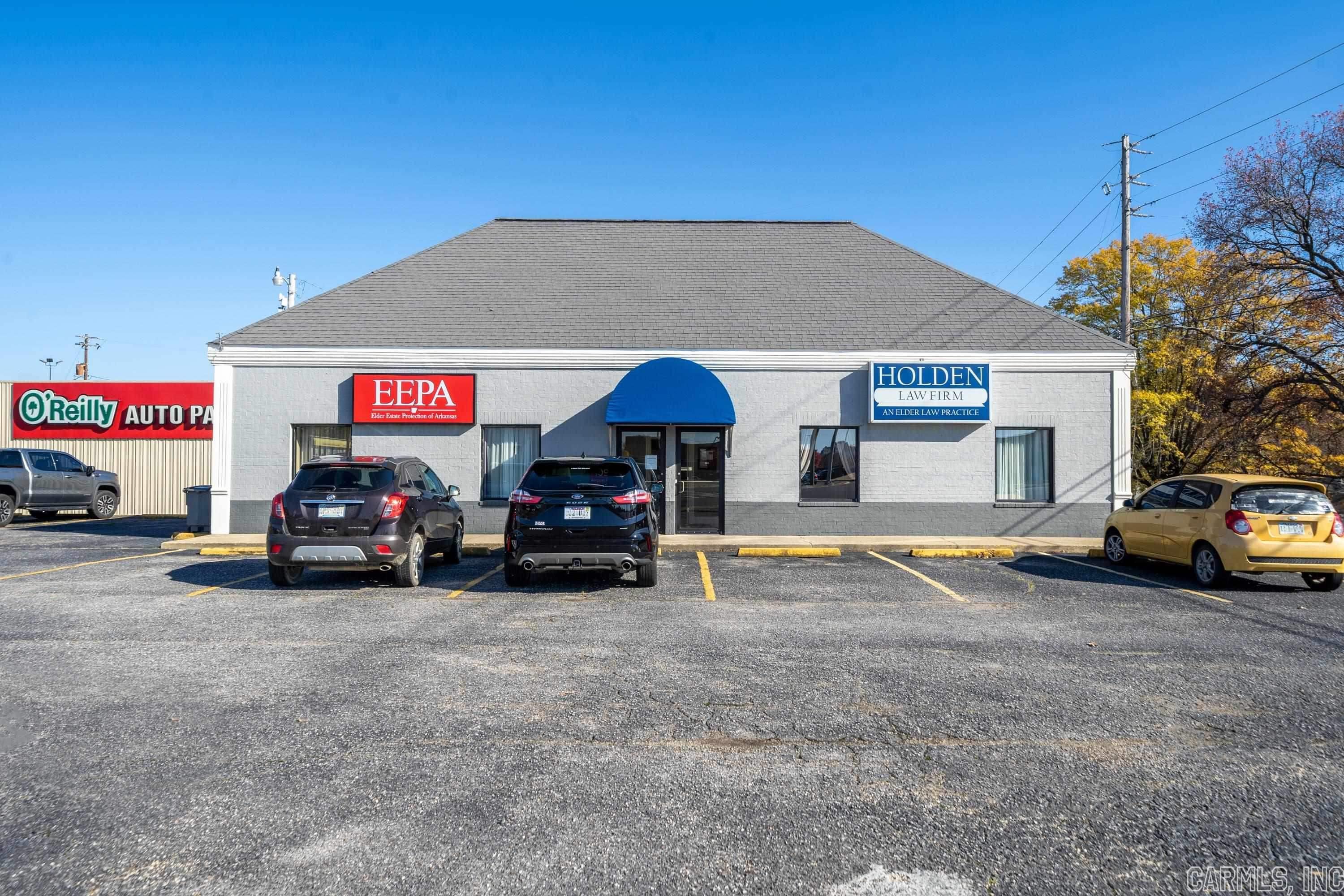 Centrally located commercial property w/high traffic count among national retailers & excellent highway frontage. You won’t find a better location for your business. One mile from Memorial Field Airport, shopping & restaurants. 1800 sq ft office building w/large reception area & other individual offices. Spacious conference room. Kitchen/Breakroom & handicap accessibility.