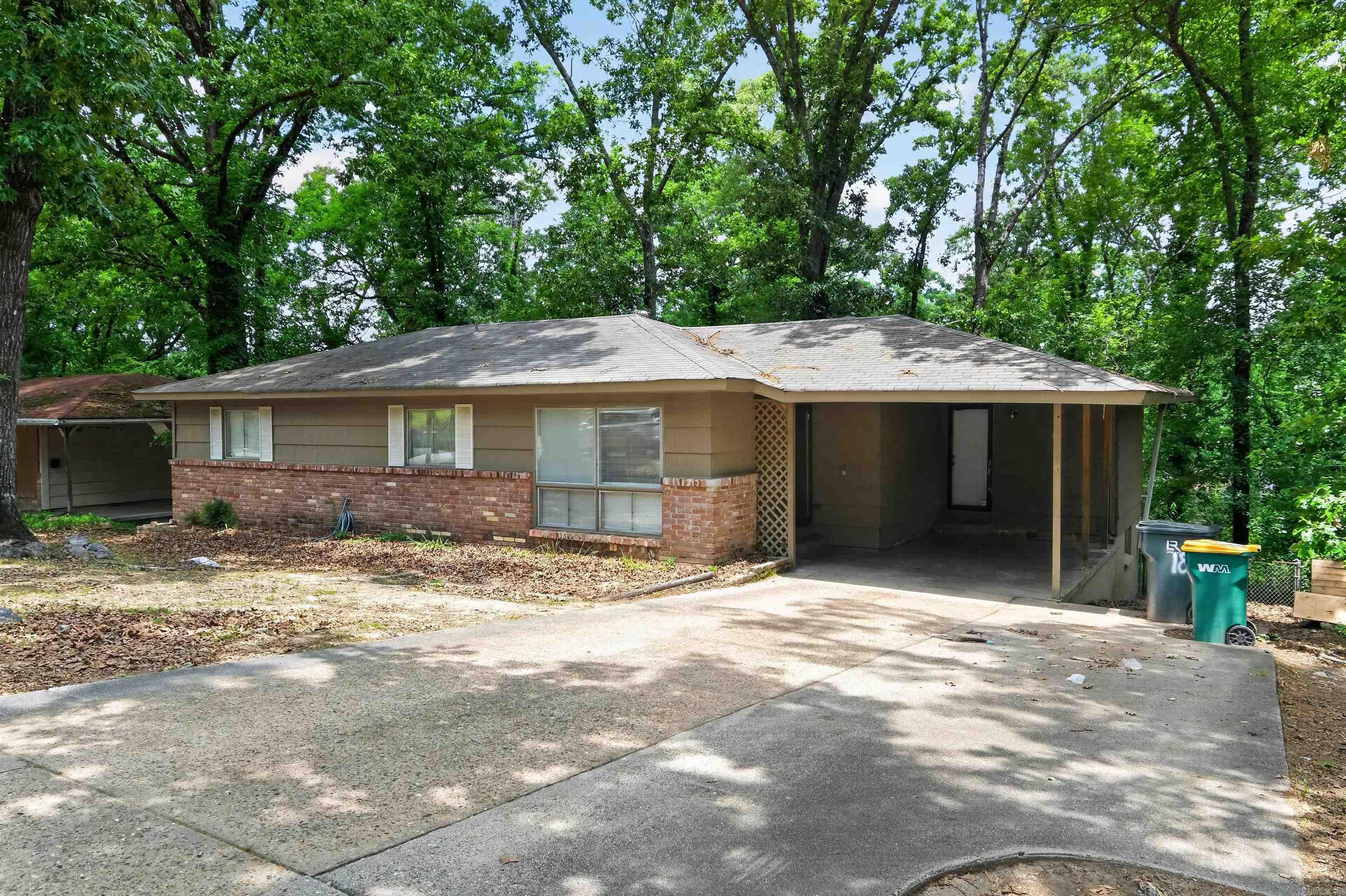 Welcome to this charming 1,522 sq. ft. ranch-style home in the established Meadowcliff community. Situated on an expansive 0.30-acre lot, this property offers rare space and privacy in the heart of Little Rock. The 2-bed, 1-bath layout features a classic 1950s footprint with an attached garage. Recent nearby sales highlight the area's incredible value for investors or first-time buyers. With flexible R-2 zoning and a deep backyard, the lot is a prime candidate for an accessory dwelling unit (ADU). Enjoy quiet residential living with quick access to Hindman Park and Pecan Lake.