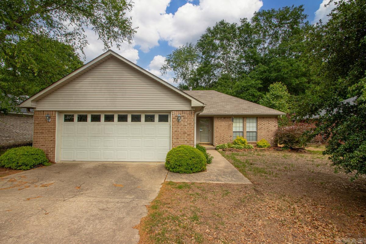 This charming 3-bedroom, 2-bath home offers the perfect blend of comfort and convenience with permanent blinds, durable LVP flooring, and peaceful views of birds and deer from the  green space to the rear of the home. In the perfect location, minutes from anything you need and within walking distance of Greenbrier Middle School, this cozy property features granite countertops, ample storage throughout, and a large fenced backyard—perfect for entertaining, relaxing, or simply enjoying the serene outdoor setting.