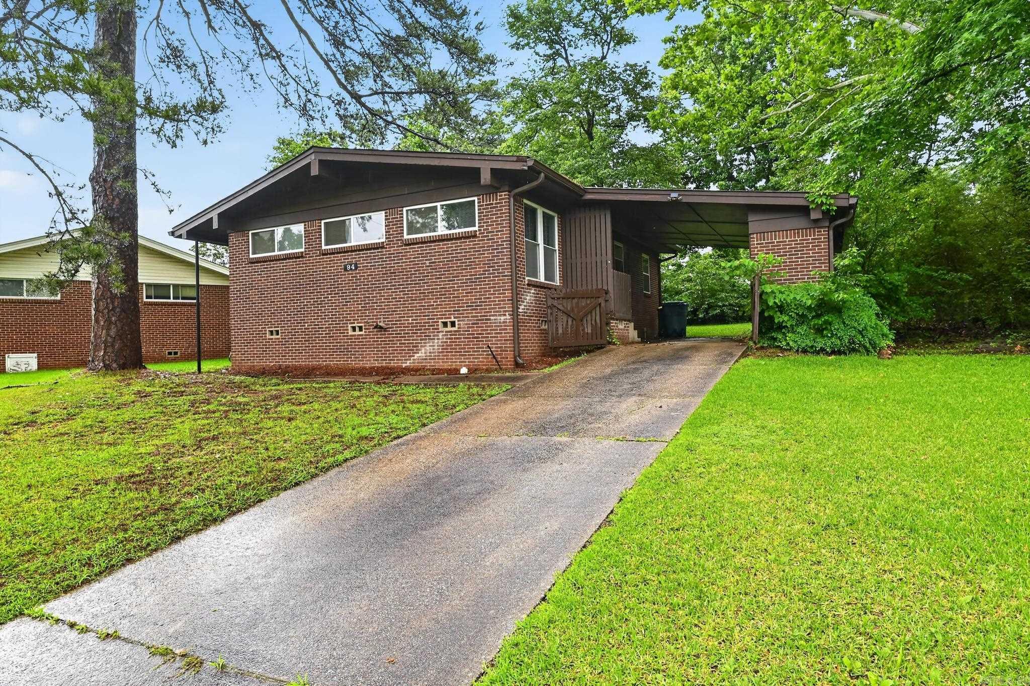 Welcome to 94 Broadmoor Dr in Little Rock! This charming 3 bed, 1 bath brick home houses a great blend of comfort and convenience in an established neighborhood. Built in 1954, and featuring a functional, 950 sqft layout with spacious living areas, this home provides plenty of natural light and room to relax or entertain. The kitchen features ample cabinet space and flows easily into the dining area. Bedrooms are well-sized, providing flexibility and comfort. The yard space is prime for outdoor enjoyment, gardening, or future enhancements. A large carport is a stand out feature Conveniently located near shopping, dining, schools, and major roadways. Don’t miss the opportunity to own a home in a central Little Rock location with strong potential and everyday convenience.