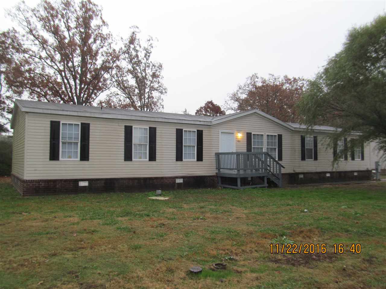 Oversized doublewide home on a foundation, 4 large bedrooms, sitting area or office area off master bedroom, 2 spacious living areas, freshly painted and new flooring throughout, large kitchen with dishwasher & range/oven, pantry off laundry room, large backyard, ready to move in!