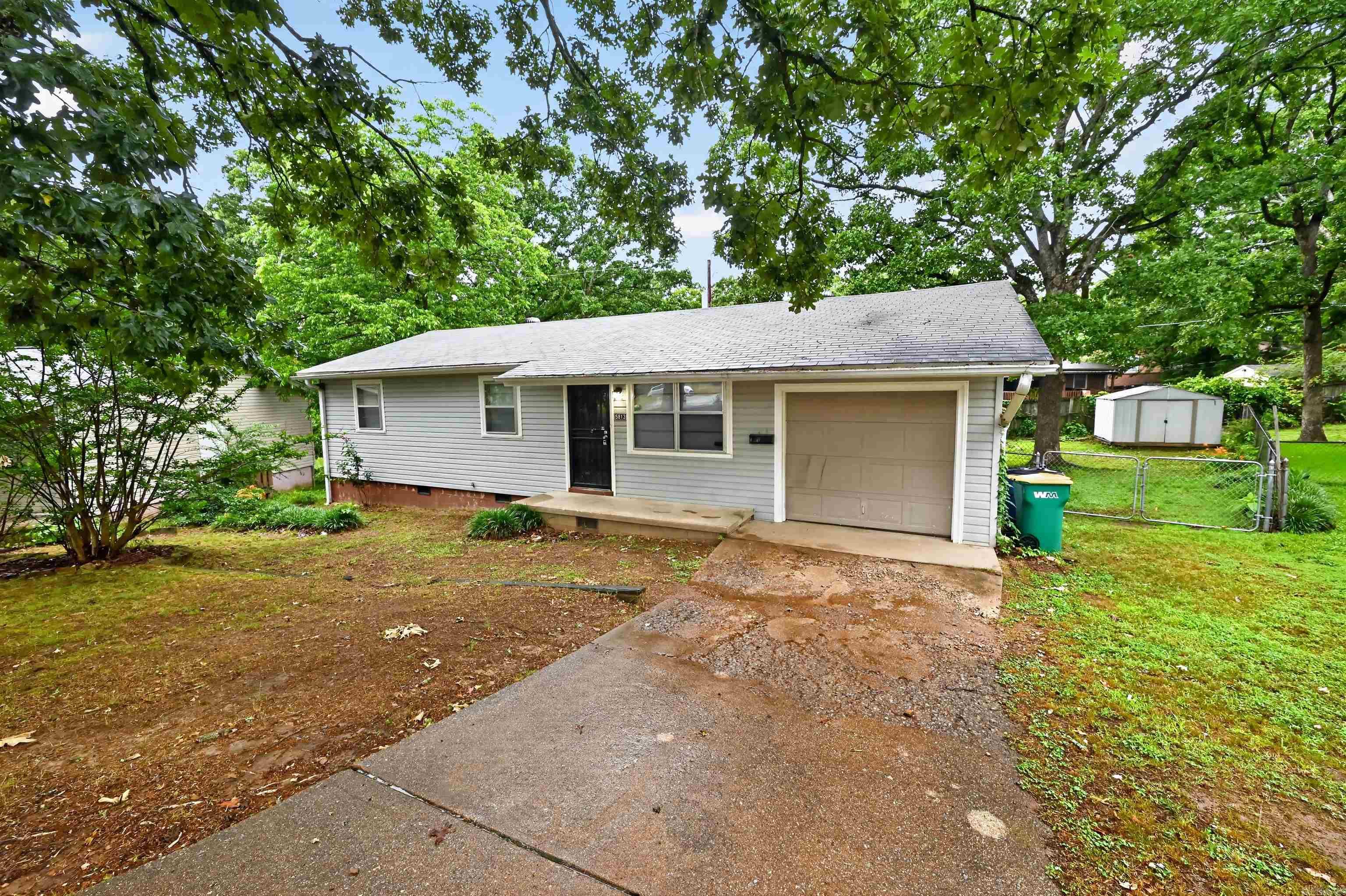 Tucked away at the end of a quiet cul-de-sac, this charming 3-bedroom, 1-bathroom single-story home in North Little Rock offers fantastic value and modern comfort. Boasting 1,320 square feet of traditional living space, the interior features a large kitchen and dining combination equipped with a gas range and plenty of functional cabinet space. Extensive premium updates provide total peace of mind, featuring a newer architectural shingle roof, a complete HVAC system update with sub-floor ductwork, a newer water heater, and updated laminate flooring. The layout also includes a renovated bathroom vanity and sink. Step outside to find a generous, level yard space featuring an attached garage layout and an extra storage shed in the backyard. Centrally located just minutes from major highways, local parks, and shopping hubs