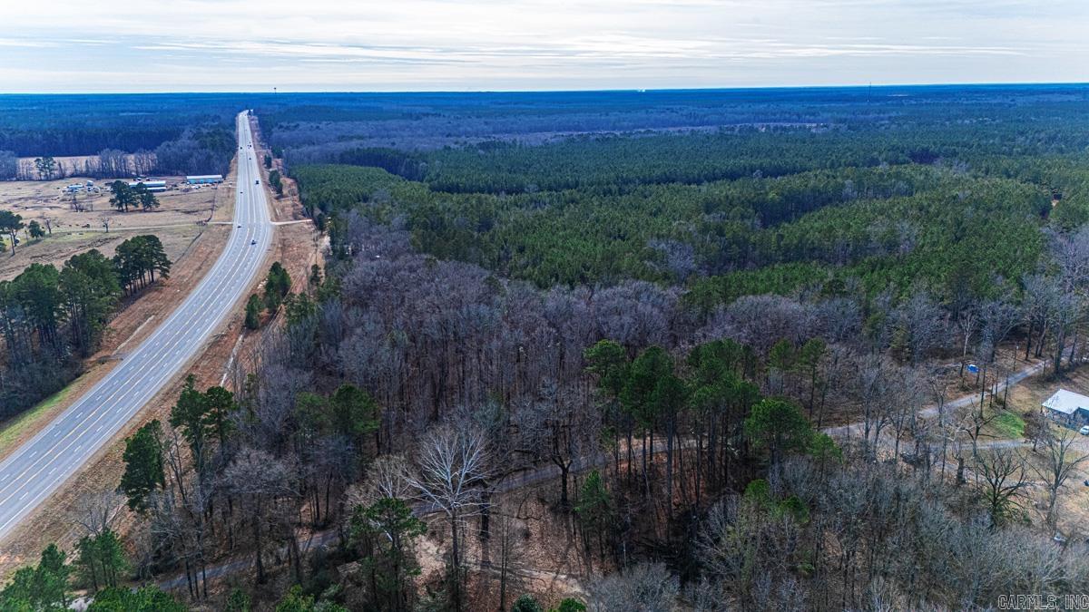 This 3.6 acreage has no restrictions. It is ready for a buyer. Come take a look today.  Utilities to be confirmed by buyer. Water across the street to home is with Sardis and Entergy for electric. Lots of hardwoods on this property.  Existing survey on file.