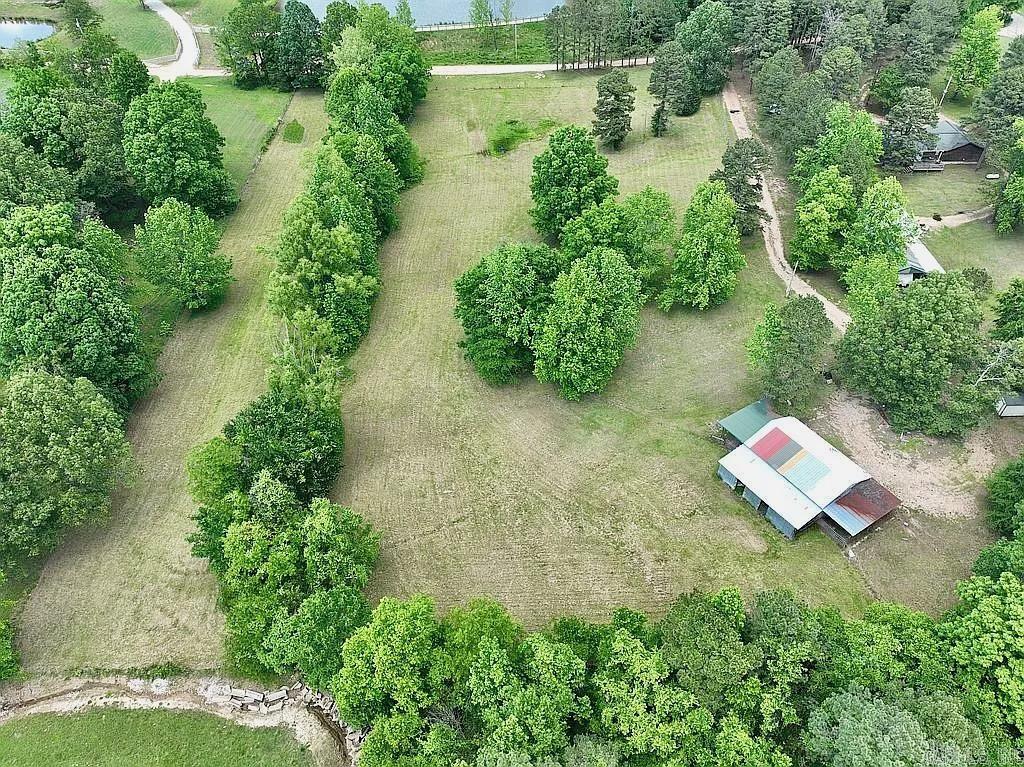 Hello country living! 5 acres (+/-) of cleared land with beautiful shade trees on the outskirts of Jonesboro and Brookland- complete with a 30 x 40 ft building! Building is already partially insulated & heated/cooled! This property already has a nice gravel driveway and utilities ran to it (water, sewer, power, cable tv, & internet), making it ready for you to build your dream home- and it is fully fenced in case you are just looking at using it for your livestock! A great location down a dead end road only about 1/4 mile off of Highway 351! Call today for more info or to set up a viewing!