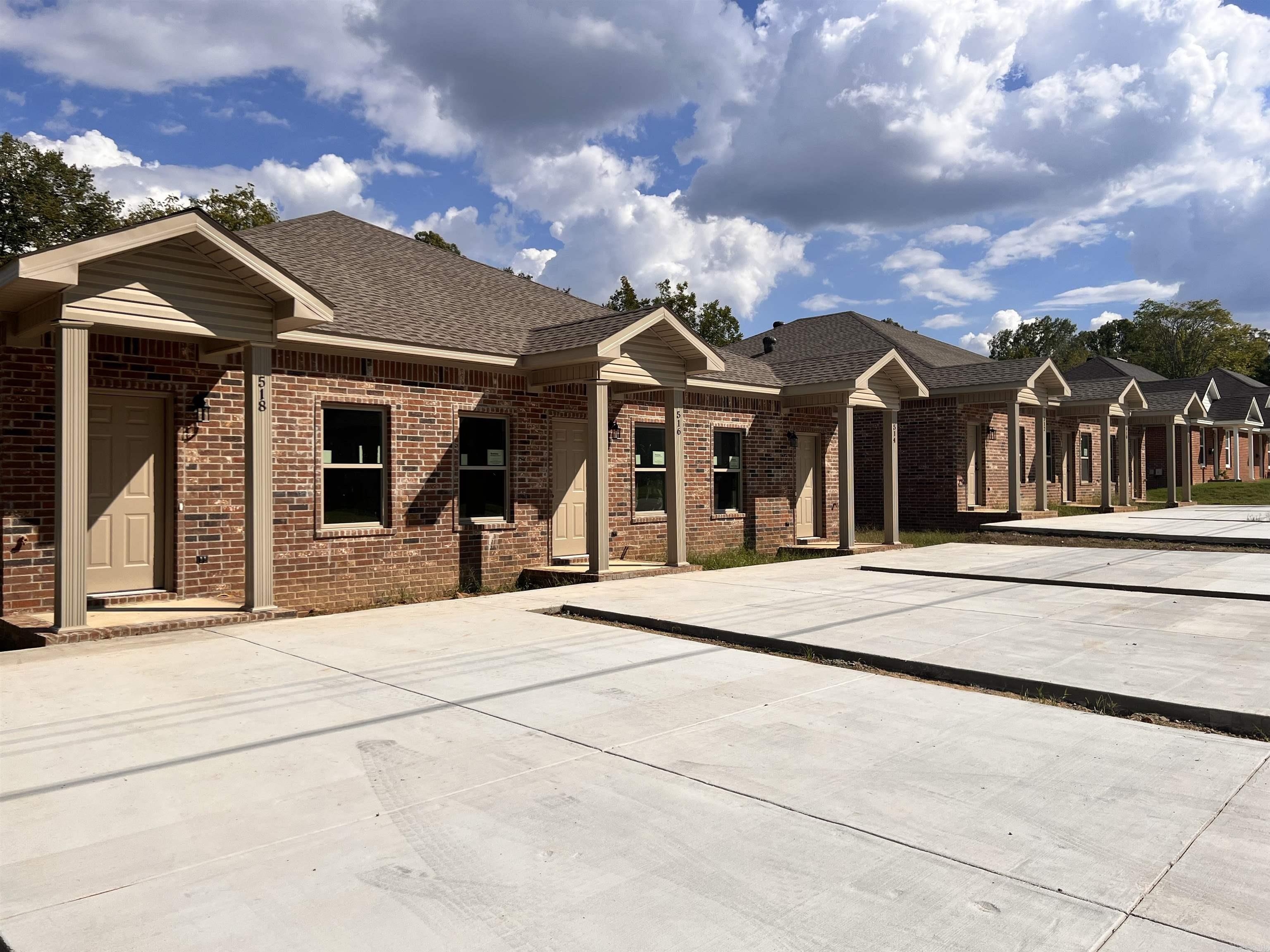 NEW CONSTRUCTION completed 2024! TWO TRIPLEXES consisting each of two 2BR/1BA and one 1BR/1BA units.  Each triplex unit approx. 843 SF.  ONE DUPLEX containing two 2BR/1BA units.  Each duplex unit approx. 852 SF.  All units include 9ft ceilings, granite countertops and laminate flooring.  Property ideally located to schools and many city conveniences. Property is cornered by Academy and Oak St.