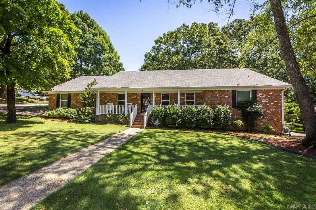 This beautiful Lakewood home has it all!!  Conveniently located close to NLR Middle School, tons of shopping and plenty of dining!  The sellers have it move in ready with brand new flooring and fresh paint!  All bedrooms are downstairs on the same level and there are multiple living areas.  The galley kitchen is very unique with a brick surrounded stove! You can enjoy the outdoors by rocking on the front porch or relax in the spacious screened-in porch our back! There is a HUGE bonus room upstairs!