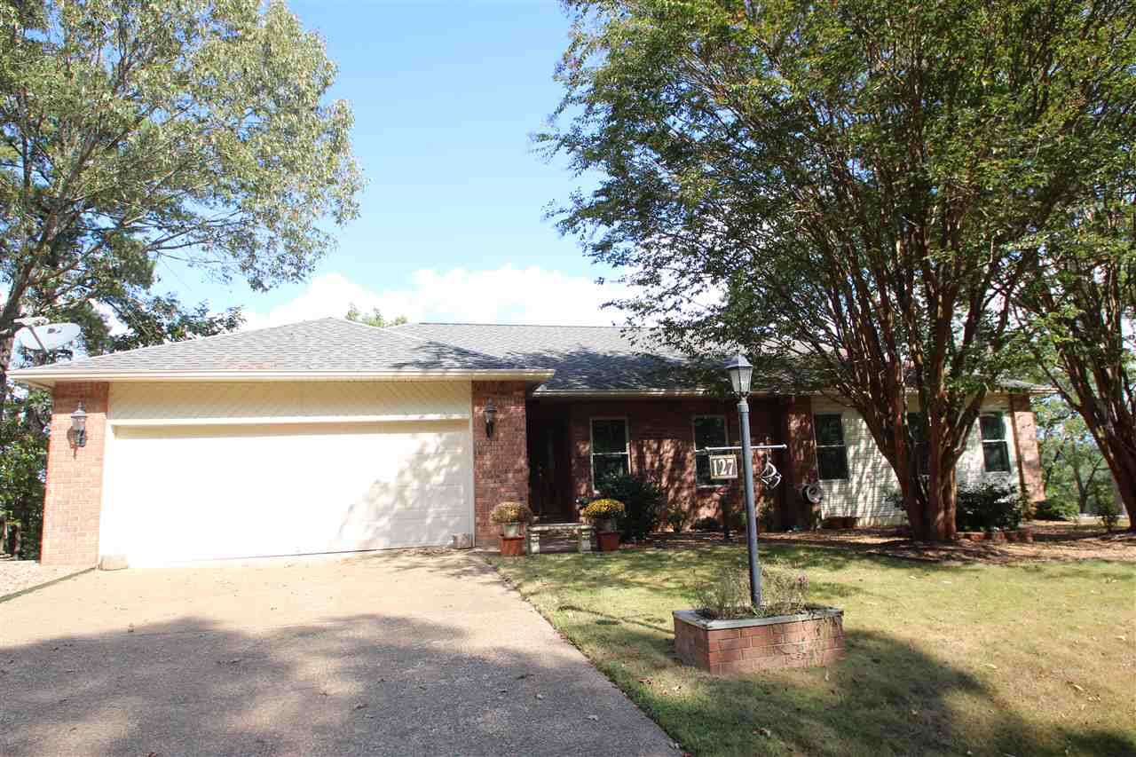 TRAVEL THE SCENIC ROUTE and enjoy every day of your life! WAKE UP, SMELL THE COFFEE & ENJOY THE INCREDIBLE PANORAMIC VIEWS OF LAKE CATHERINE & OUACHITA MTS. Tons of natural sunlight and outstanding views flow into your home from the many windows overlooking the lake. Open floor plan with Maple floors and room for a grand piano! This home has many extras, Outdoor Retractable Awning, Whole House Generator, Garage/Air Compressor, Work Shop with Cabinets, Gas Dryer & Fire Place Muti Purpose Golf Cart Garage,