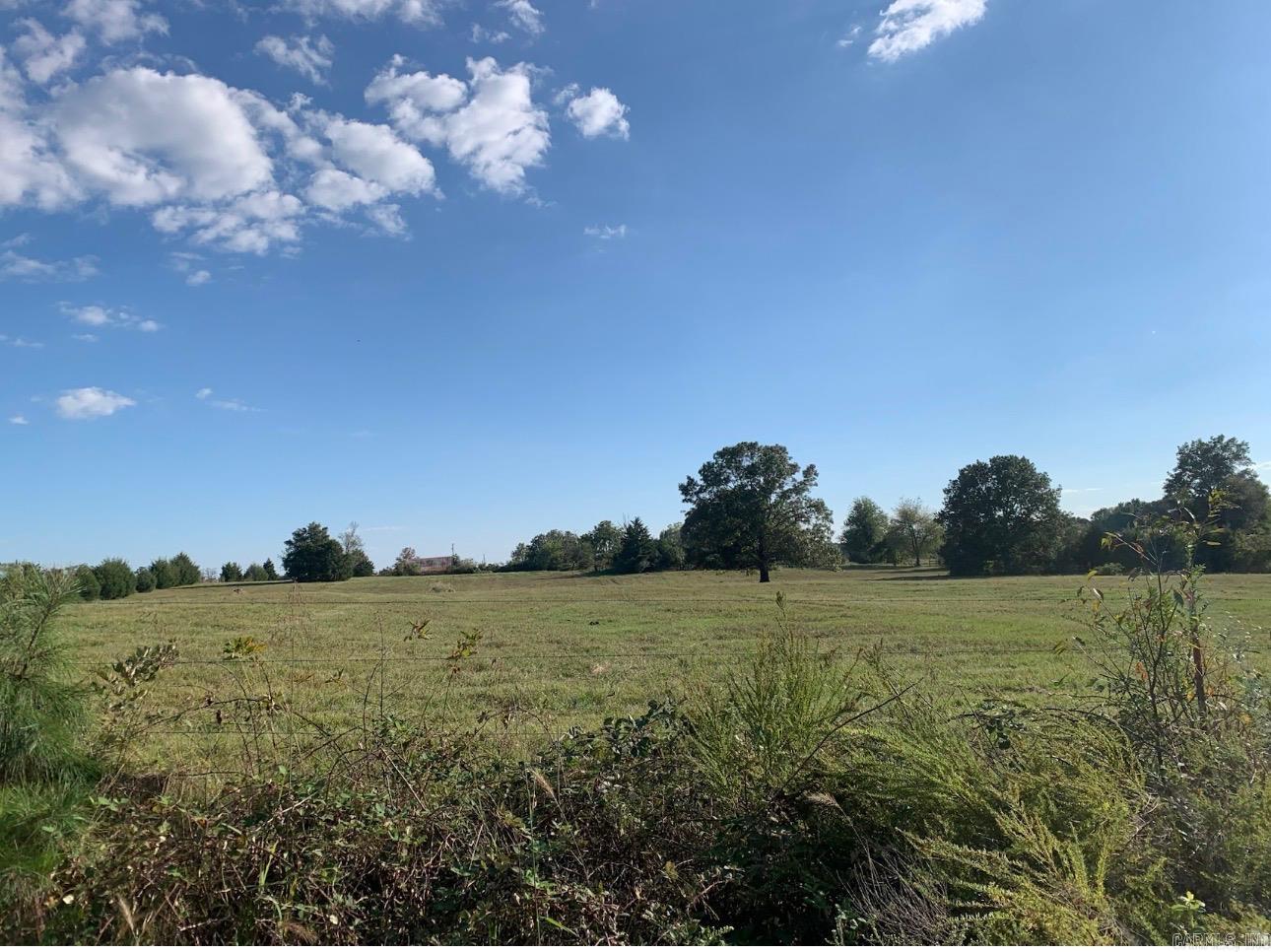 If you are wanting to build your dream home then you have found the perfect spot.  Paved road with a corner 5 acres, pasture with small pond.  Mostly fenced.  Be in Searcy in about 15 minutes and Rosebud in 10 minutes.  Great location with nice farms in the area. Electric and water are in front of the property on the road.   Perfect for horses, etc...no restrictions.  Mobile homes are allowed