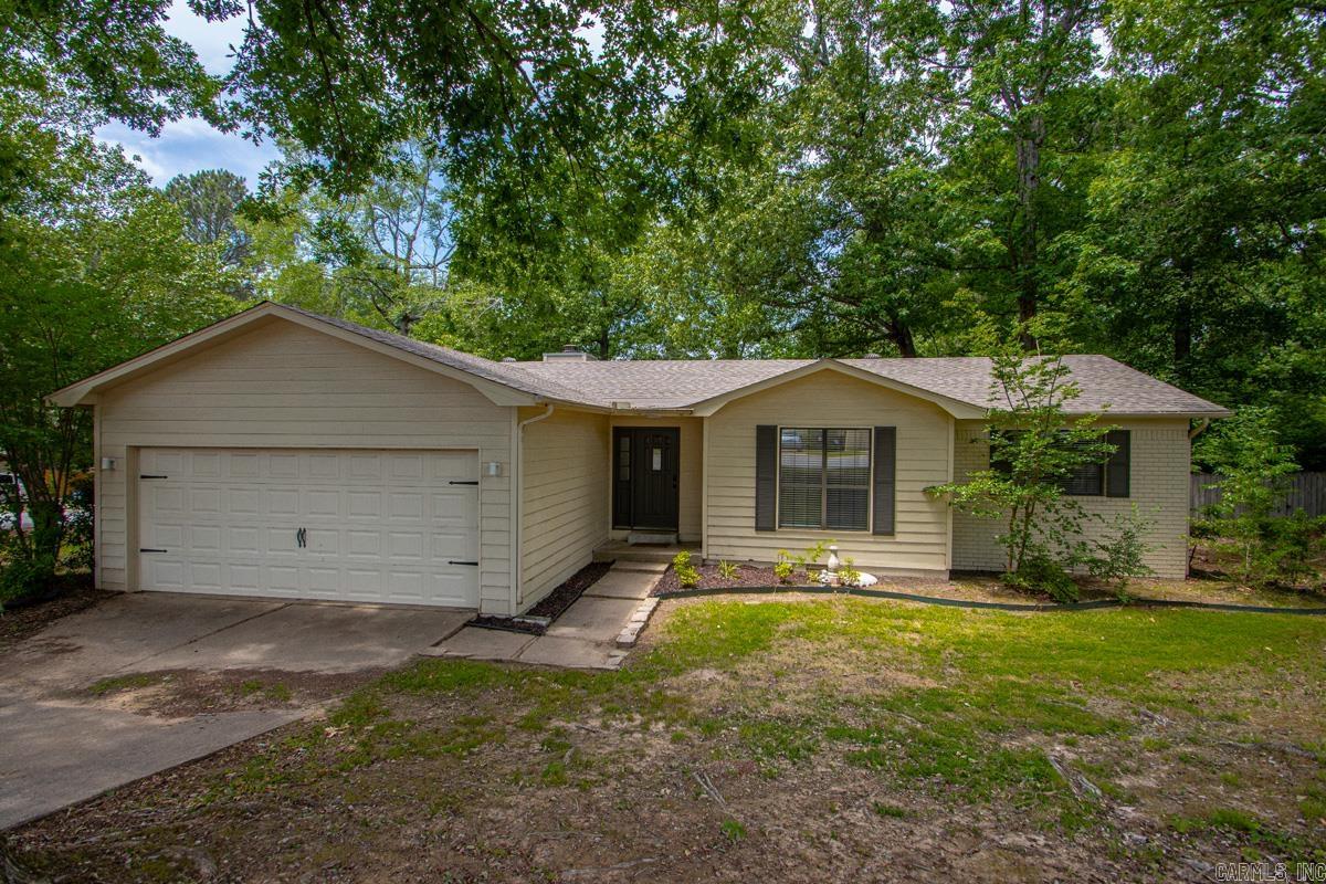Location, Location, Location! Nestled in Raintree Acres in the heart of Bryant sits this 3 bed, 2 bath home just seconds from everything Saline County has to offer. And with the addition of Bryant Parkway, you’re only moments away from easy access to both Little Rock and Benton. Step through the front door and you’ll find a spacious living area complete with a brick fireplace. The kitchen offers plenty of cabinet space along with laundry hookups, making it easy to keep everything convenient and functional in one area. Down the hall are two spare bedrooms and a full bath. The primary suite features a large walk-in closet with plenty of storage space. Out back, you’ll find a deck overlooking a private backyard setting — perfect for relaxing or entertaining. This home does have foundation movement and has been priced accordingly. Agents, see associated documents for the full inspection report.