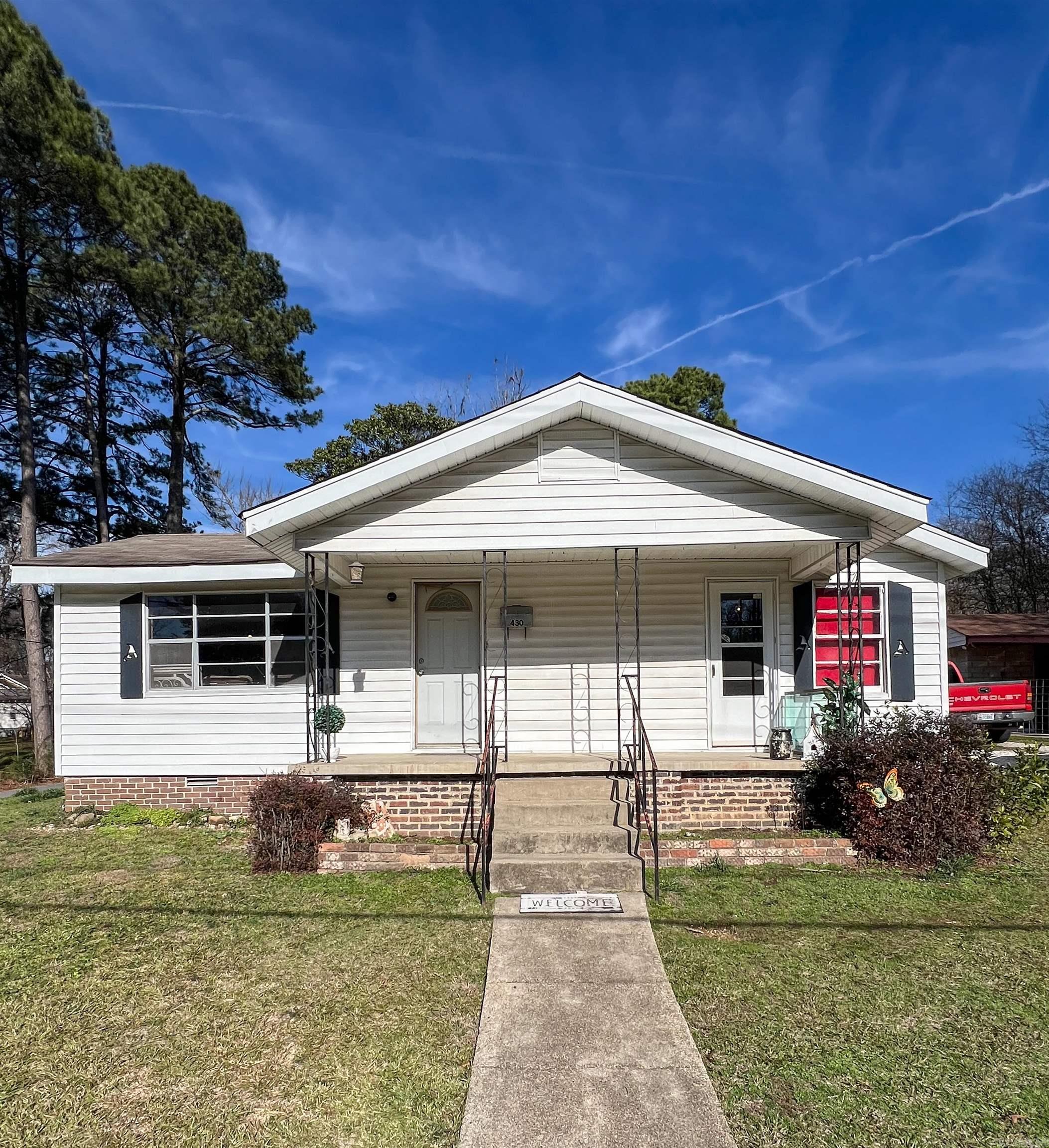 Check out this great investment opportunity just minutes away from downtown Malvern!! This home is nestled in a quiet neighborhood, and hosts 3 bedrooms and 2 baths with an enclosed patio and separate laundry room. Additionally, there are two storage buildings on the property with electric already hooked up. The seller has made some improvements but this home is ready for someone to give it their personal touch!