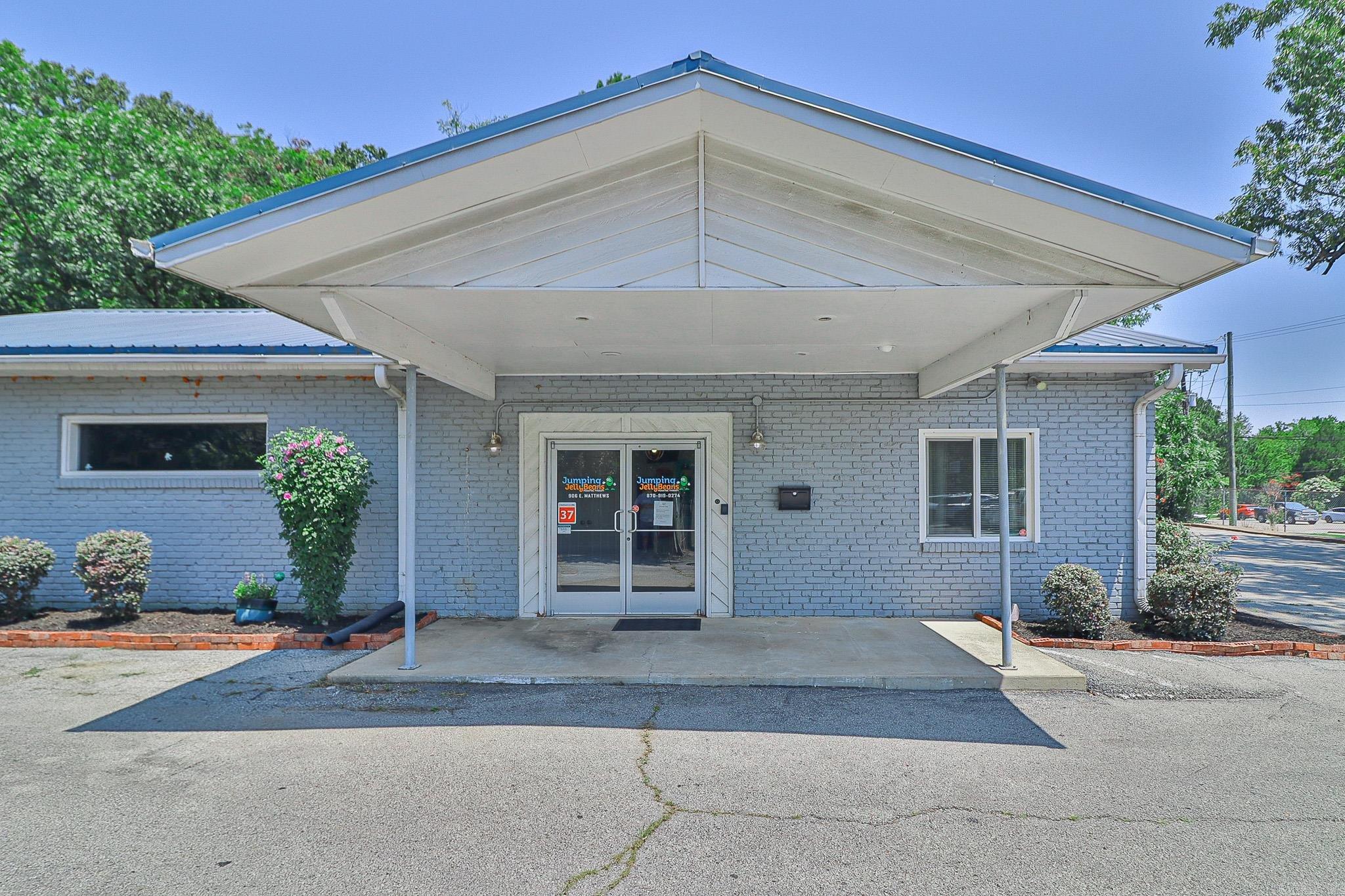 This standout 3,657 sq ft commercial building positioned on 2.18 acres is ideal for a wide range of commercial uses, including medical, office, and childcare. With over 300 feet of frontage on the Matthews Medical Mile and C-5 zoning, this property offers exceptional flexibility and is fully equipped with utilities in place, making it ready for immediate development or occupancy. This property benefits from high traffic, strong neighboring medical anchors, and excellent accessibility. It's a rare opportunity to secure a large, adaptable site in one of Jonesboro's most active commercial districts.