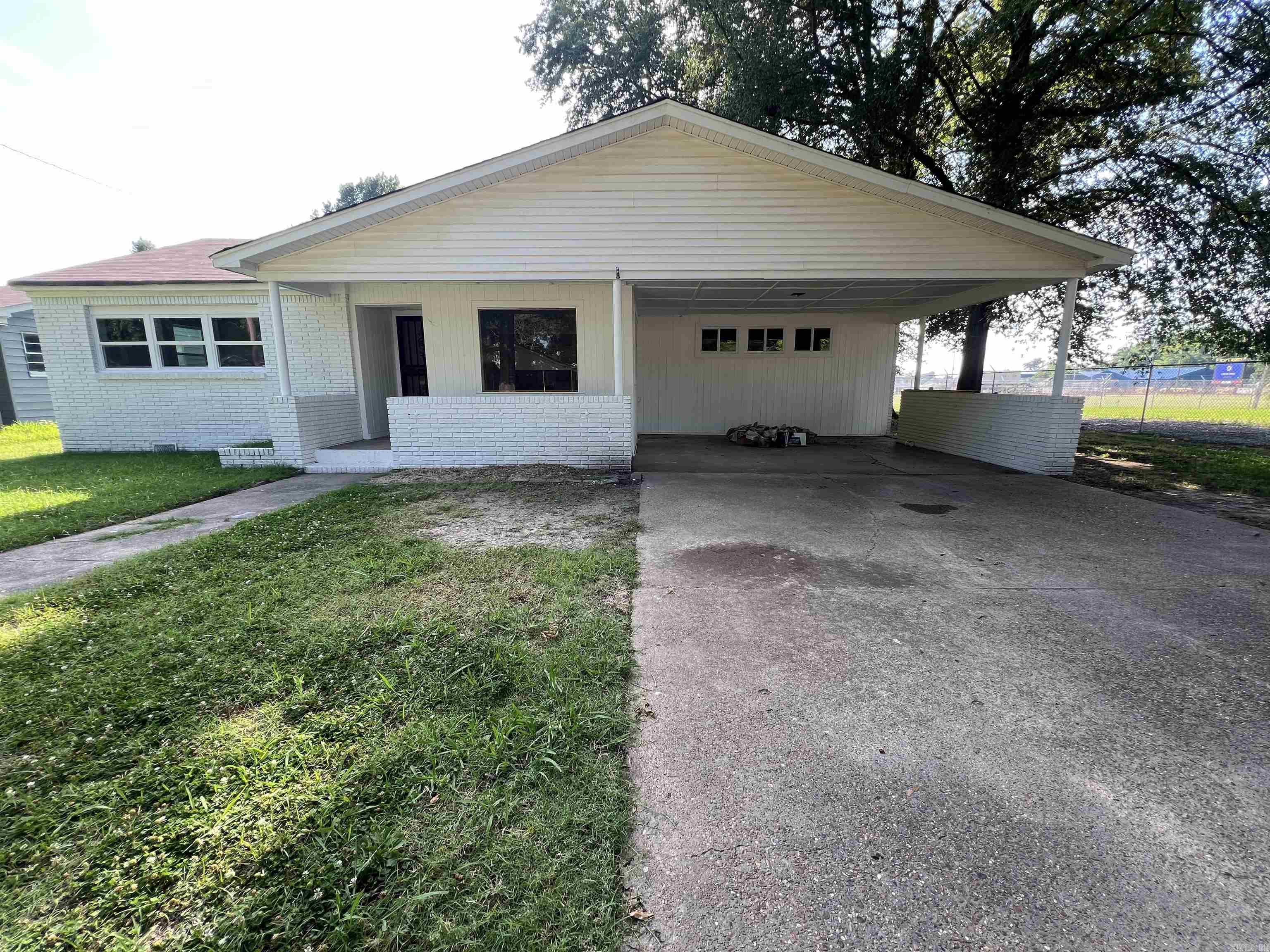 This recently remodeled home is centrally located in town and near the schools. This home offers 4 bedrooms and 2 full bathrooms.  The bonus room is highlighted by a beautiful new rock fireplace mantel.  Recent updates consist of: flooring, kitchen cabinets, countertops, bathtubs/showers, roof, windows (with the exception of the back room) fresh paint throughout the house and the exterior has recently been painted.  This home is move in ready with many modern up dates. Call today to schedule a showing.