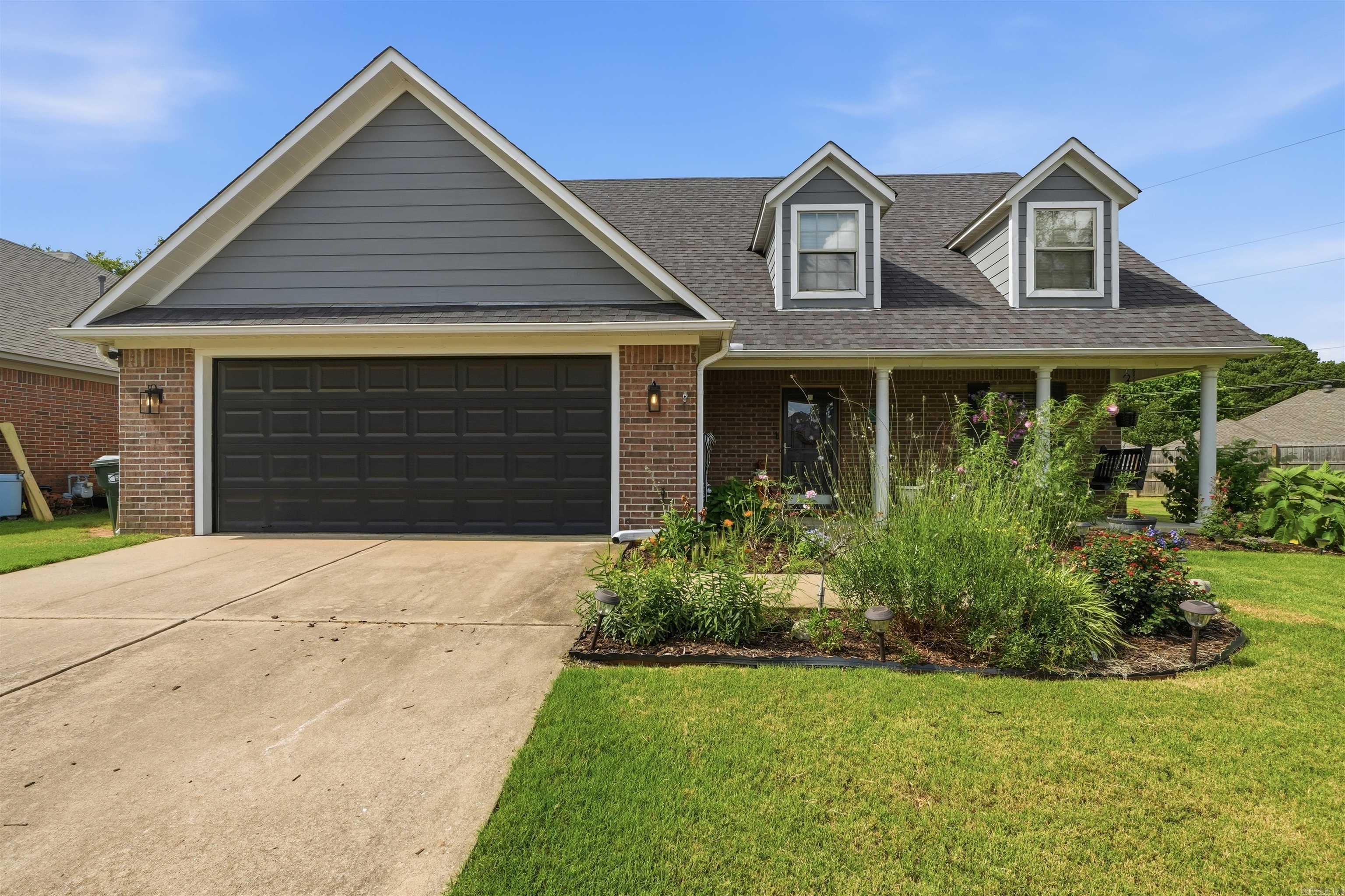 Beautiful 3BD 2 1/2 BA home on a large lot in a great location. This home has many updates. Architectural roof new in 2018, New hot water tank 2022, New paint throughout,  Kitchen has new granite countertops, sink, and backsplash, New countertops and fixtures in all the bathrooms, New flooring upstairs in the hallway and 1 bedroom, fully fenced yard, Covered front porch with swing, Plus a covered back patio, The downstairs: half bath, coat closet at entry, laundry rm, eat-in kitchen, spacious den, master suite w/ dbl vanity, walk-in shower, jetted tub, walk-in closet, luxury plank vinyl flooring throughout the downstairs. There is also a 5x7 storage building that will stay. This property is also close to Centennial Valley Country Club, you can drive your golf cart to the club. Agents please read showing remarks!