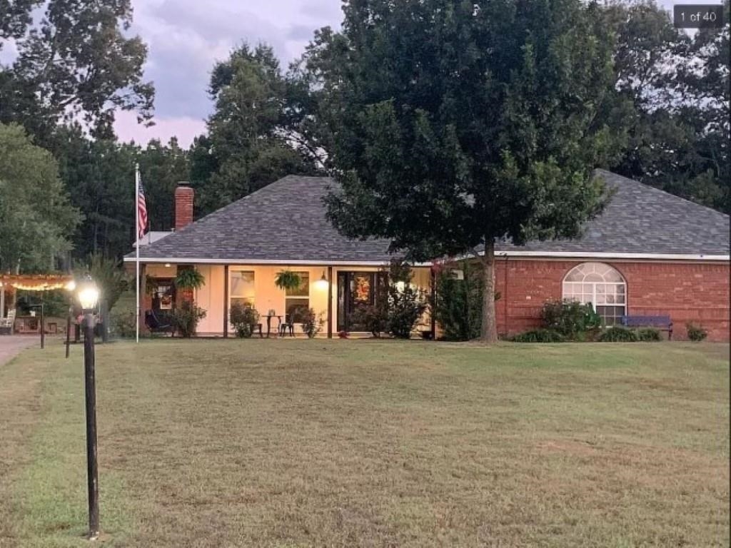 Beautiful gated country home w/ lots of extras! House includes a solar powered gate, 3 acres fenced in, extra large 2 plus car garage, in ground storm shelter, 30x40 insulated shop, 2 additional awnings for RV storage, garden space, and pergola.  Main bedroom includes 2 walk in closets and a large custom main shower. Enjoy a beautiful country view, the newly renovations, energy efficient home, with shop! One room could be a 4th bedroom but we are calling it a bonus room.  See agent remarks please.
