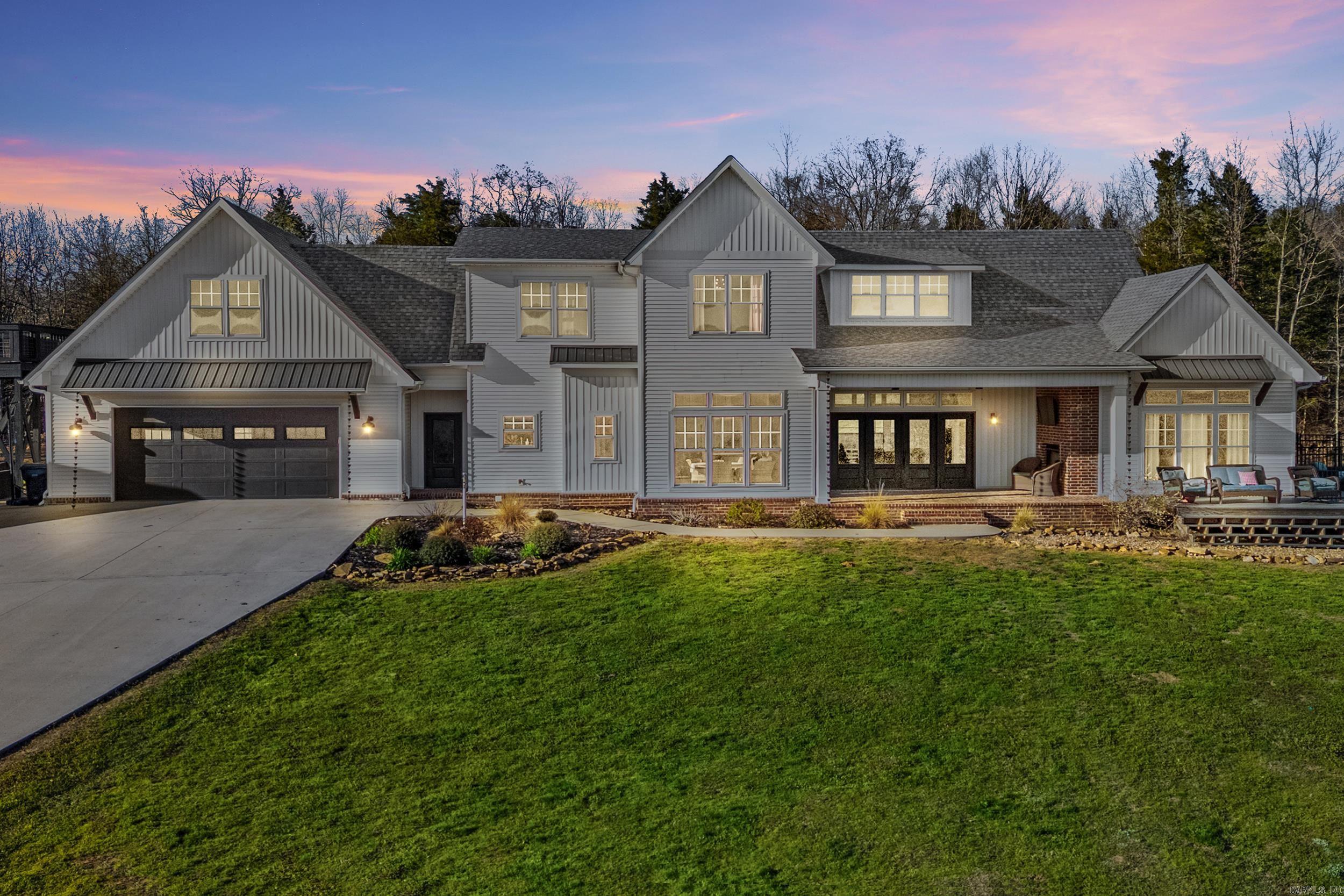 On the ridge of Turkey Mountain sits this stunning 4 bed 3.5 bath home on just over 8 acres. From outdoor built-in light shows to whole-home instant hot water, don't miss this one! European white oak flooring, butler's pantry, quartz countertops in the whole place, indoor walk-in safe room, 10ft ceilings, duel fuel heat, gas fireplaces indoor and outdoor, 2 commercial refrigerators washer and dryer conveys, inground salt pool with cantilever coping, tanning ledge, slide, and diving board, herringbone brick floor patterns in spots, huge 30*30 shop with separate apartment, stadium lights for the yard, whole-home Bose speaker system inside and out, huge observation deck, hot tub, rain chains, 50 amp RV hookup, Tesla charger in heated/cooled garage equipped with additional commercial grade fridge/freezer, separate carport with electricity that dwarfs the home, free standing tub with air jets in the Primary bath, there's just so much to see. Make this one yours today! Check showing/agent remarks for additional info for your clients.