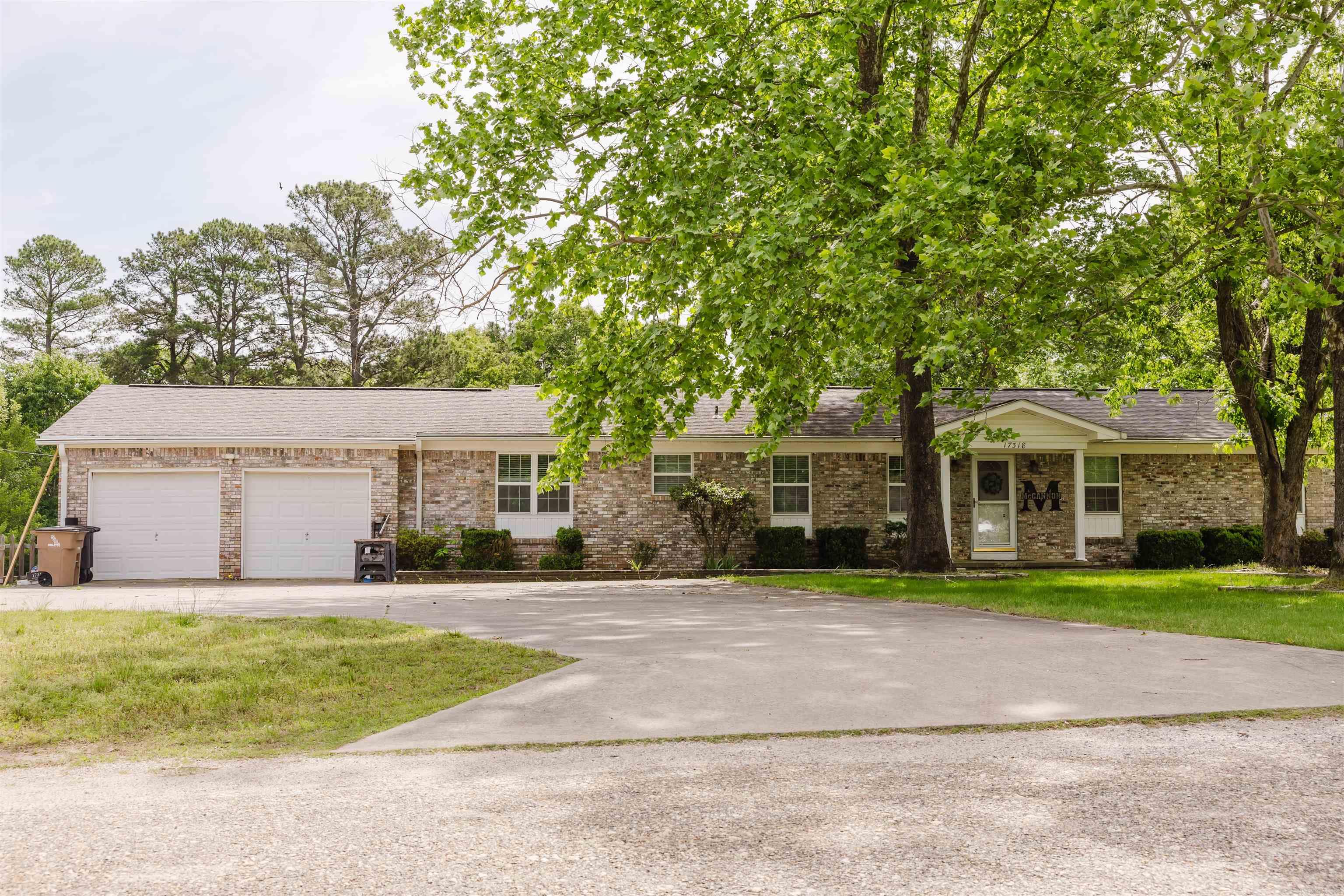 Looking for tranquility while still being only minutes away from everything?  Conveniently located near Bryant, Benton, and Little Rock, this is the house for you.  Two living areas provide plenty of space to relax or host guests.  As if that wasn't enough, you can also utilize the sunroom for entertaining or enjoy it yourself with your morning coffee. Enjoy cookouts under the gazebo.  Two outbuildings in the back yard provide ample space for storage. This well appointed home has been taken care of and is ready for a new owner.  Call to schedule your showing today.